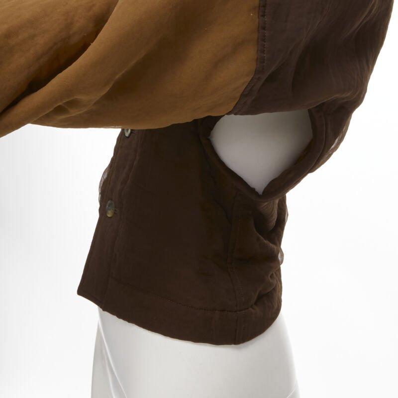 vintage COMME DES GARCONS '90 brown color blocked cut out collar jacket S
Reference: CRTI/A00400
Brand: Comme Des Garcons
Designer: Rei Kawakubo
Collection: 1990
Material: Polyester
Color: Bronze
Pattern: Solid
Closure: Button
Extra Details: Circle