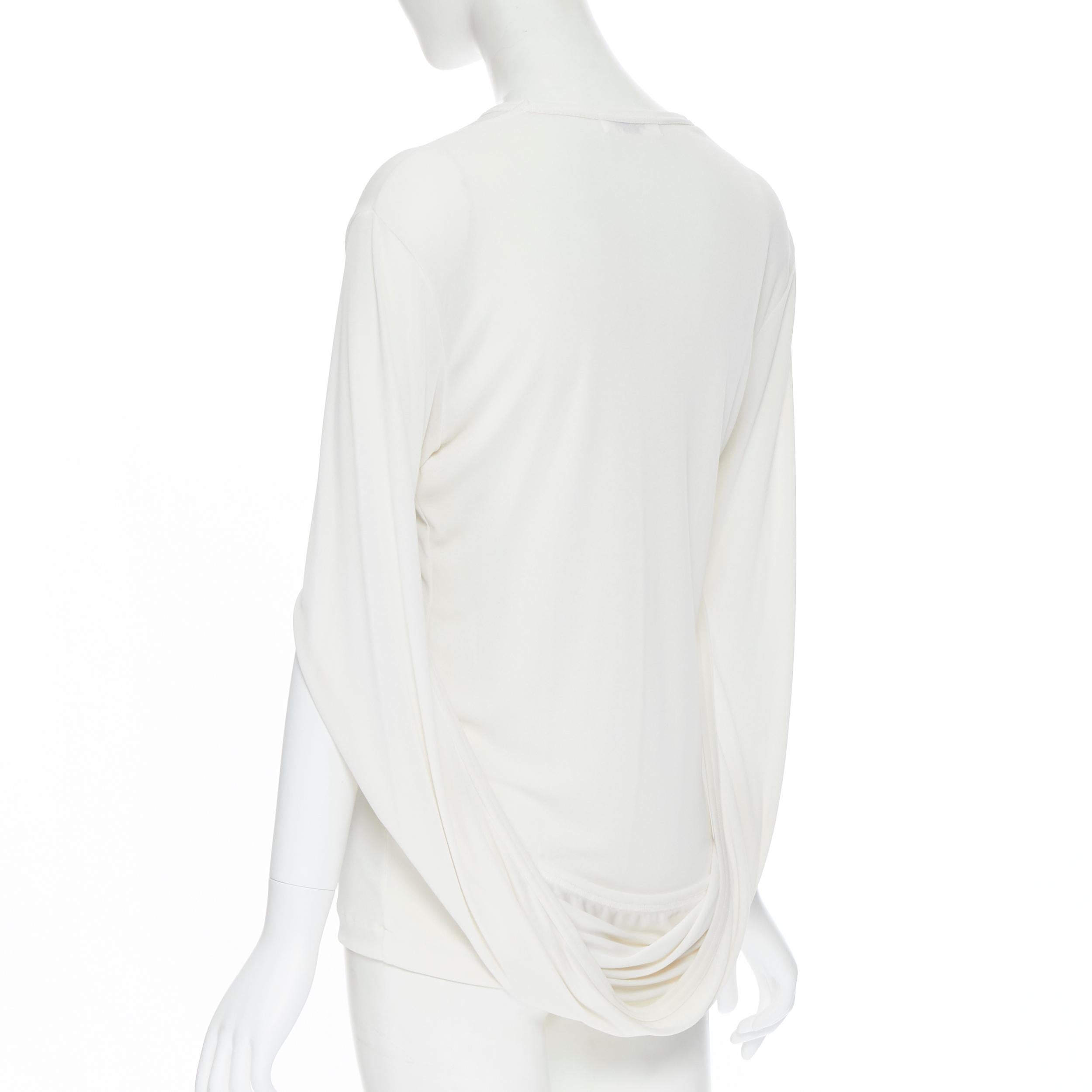 vintage COMME DES GARCONS ROBE DE CHAMBRE 1990 white infinity loop sleeve top S
Brand: Comme Des Garcons
Designer: Rei Kawakubo
Collection: 1990
Model Name / Style: Infinity loop sleeve top
Material: Cupro, polyester
Color: White
Pattern: