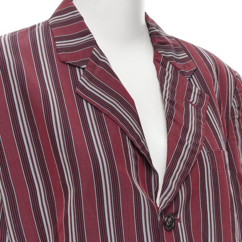 vintage COMME DS GARCONS 1991 green stripe deconstructed blazer jacket M
Reference: CRTI/A00361
Brand: Comme Des Garcons
Designer: Rei Kawakubo
Collection: 1991
Material: Rayon
Color: Red
Pattern: Striped
Closure: Button
Extra Details: Deconstructed