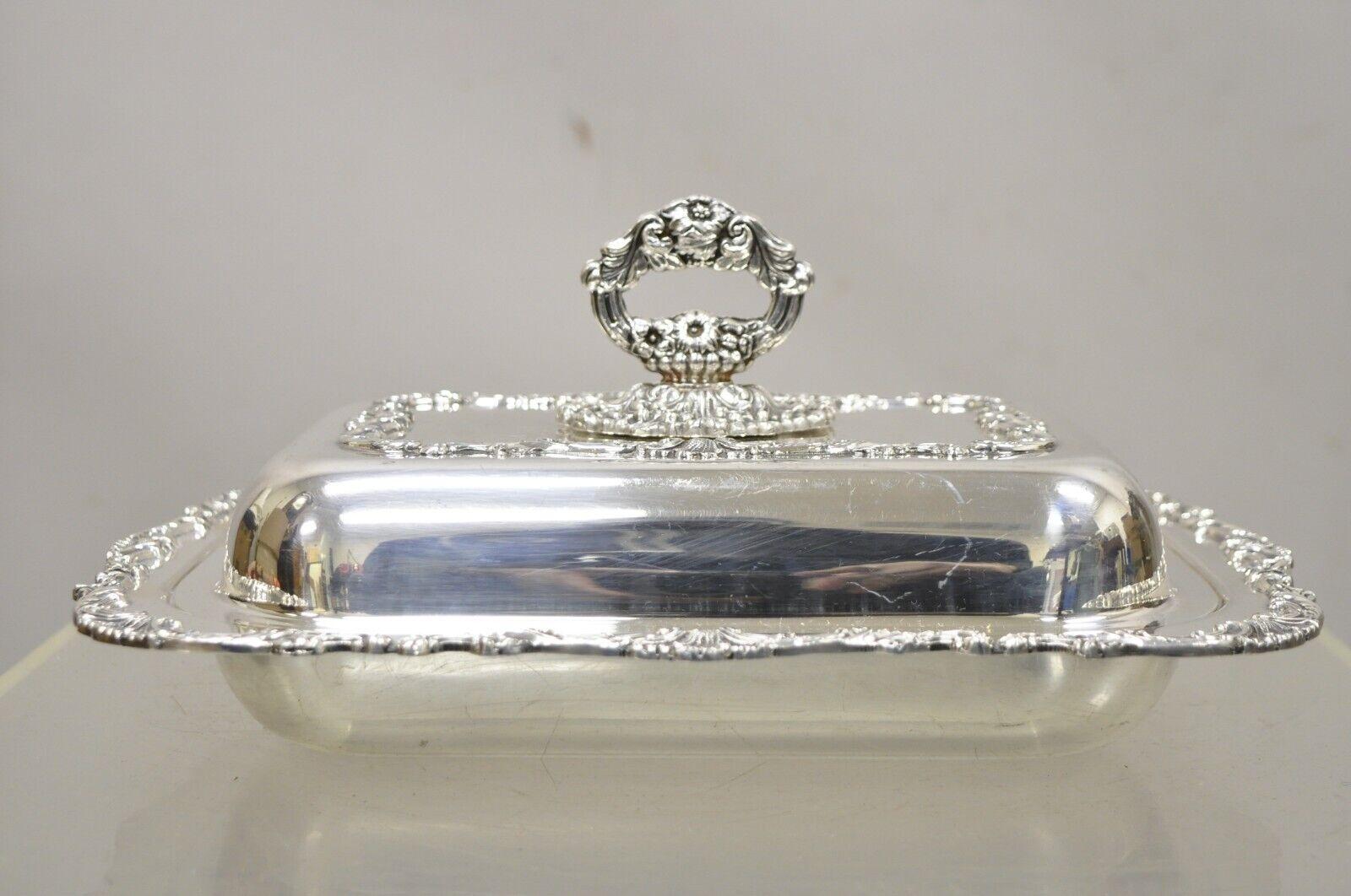 Vintage Community Ascot Silver Plated Victorian Style Lidded Serving Platter. Item features an ornate removable handle, divider to interior, original stamp, very nice vintage item, quality American craftsmanship. Circa Mid 20th Century.