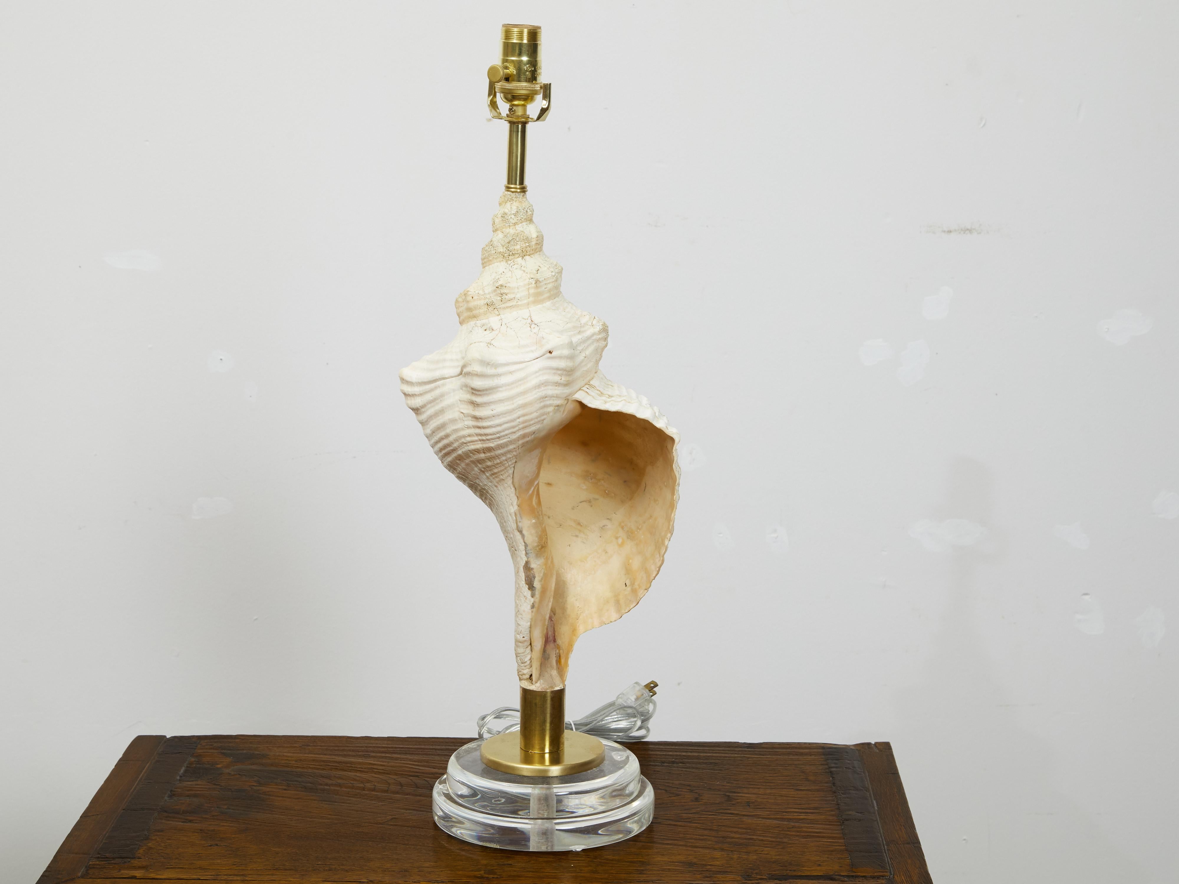 Mid-Century Modern Vintage Conch Shell Table Lamp from the Midcentury Mounted on Round Lucite Base