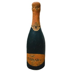 Used Concrete Champagne Bottle