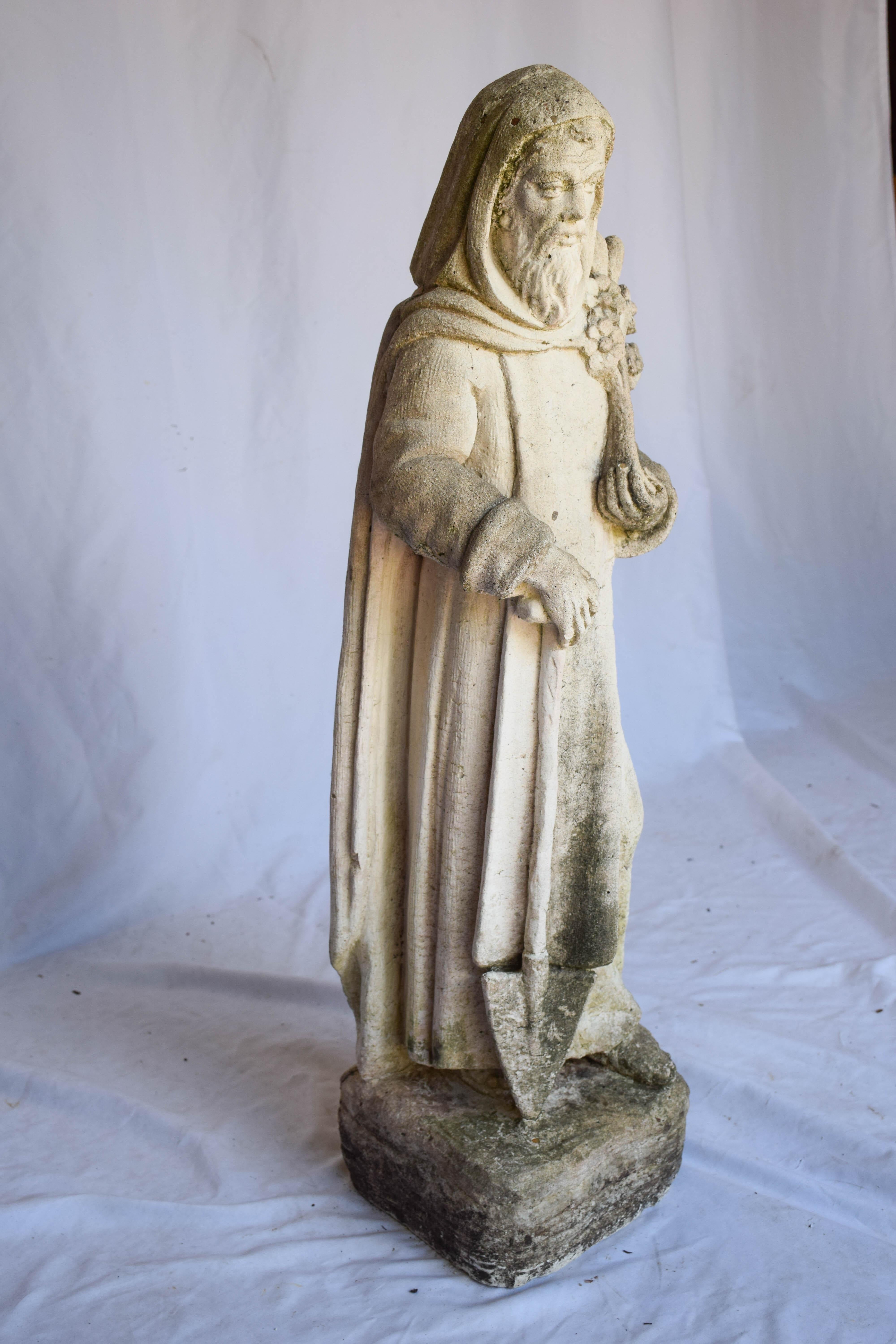 This vintage concrete statue of Saint Fiacre will look wonderful in your garden or home. Saint Fiacre of Breuil was a Catholic priest and gardener of the seventh century. He emigrated from his native Ireland to France, where he built a vegetable and