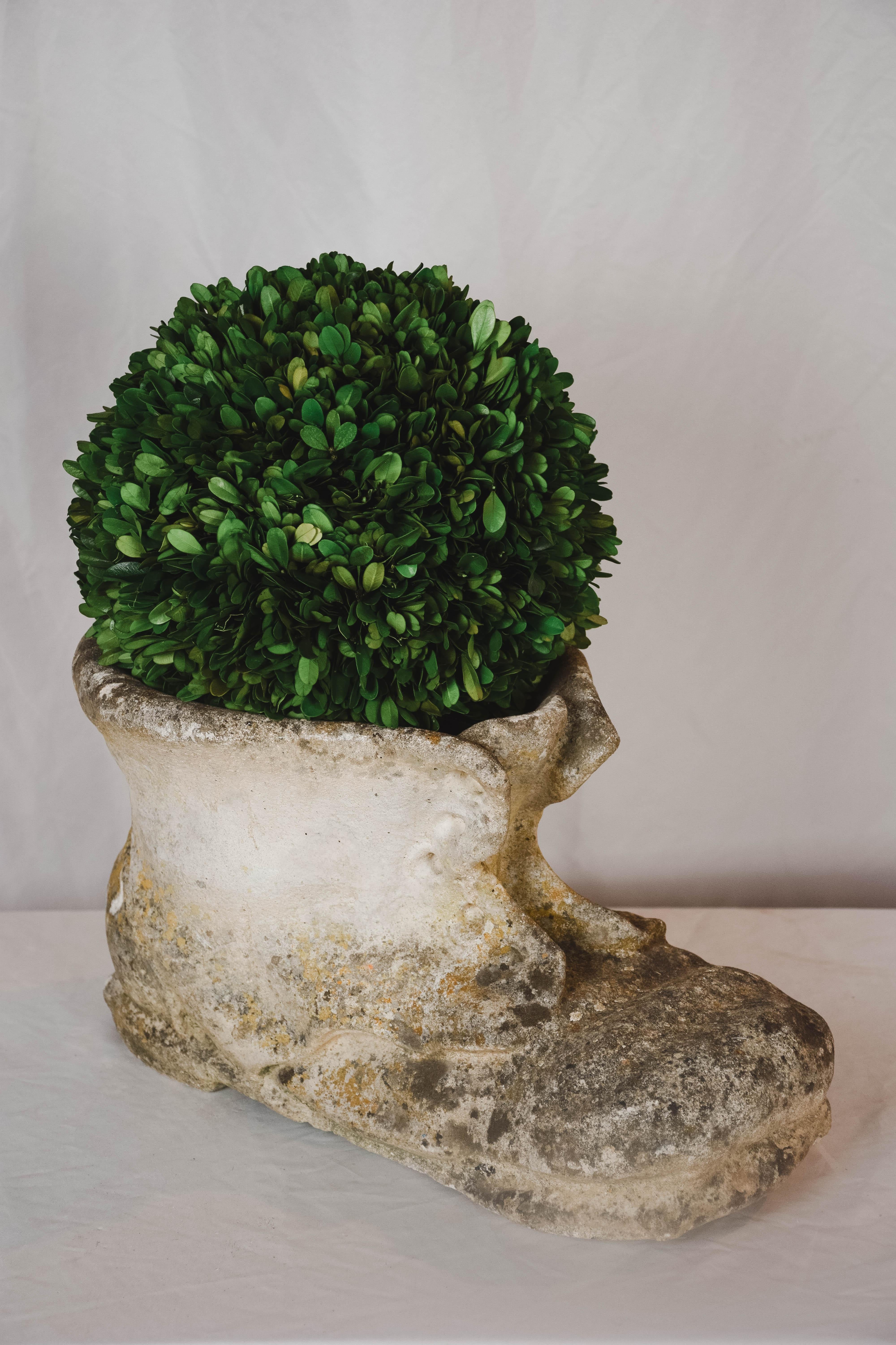 Found in Southern France, this charming vintage concrete garden element in the form of a shoe would look great with or without a plant either outside or in. .