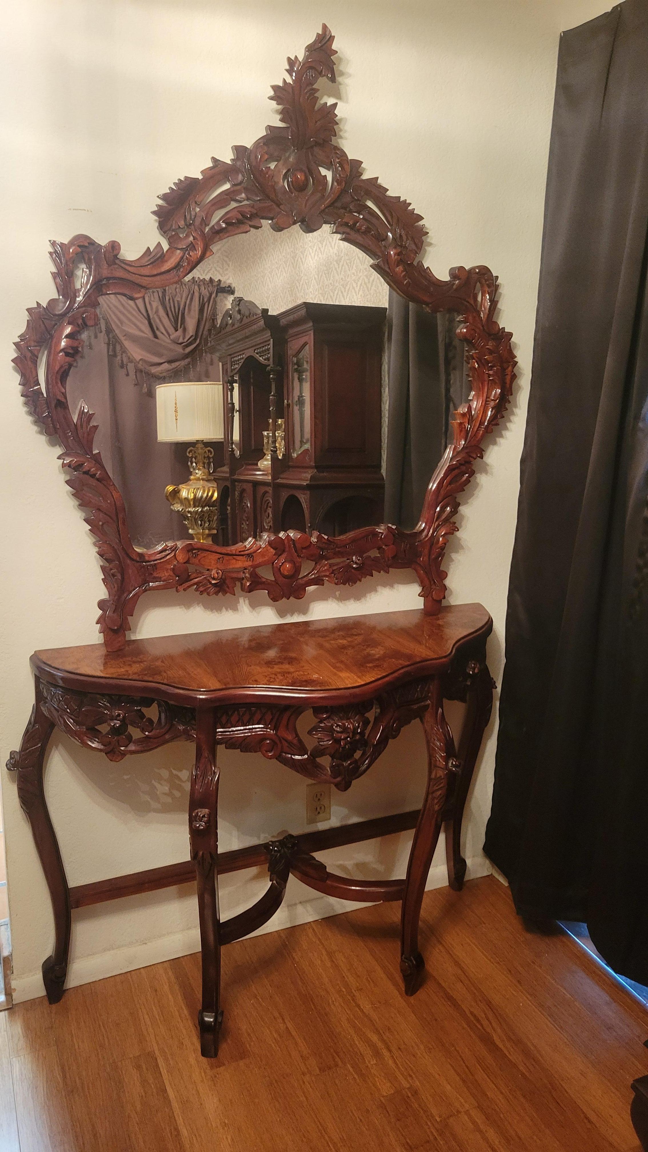 Vintage Demi-Lune console table and hand-carved wall mirror. Both items are made out of solid wood, most likely pine. The table is 44