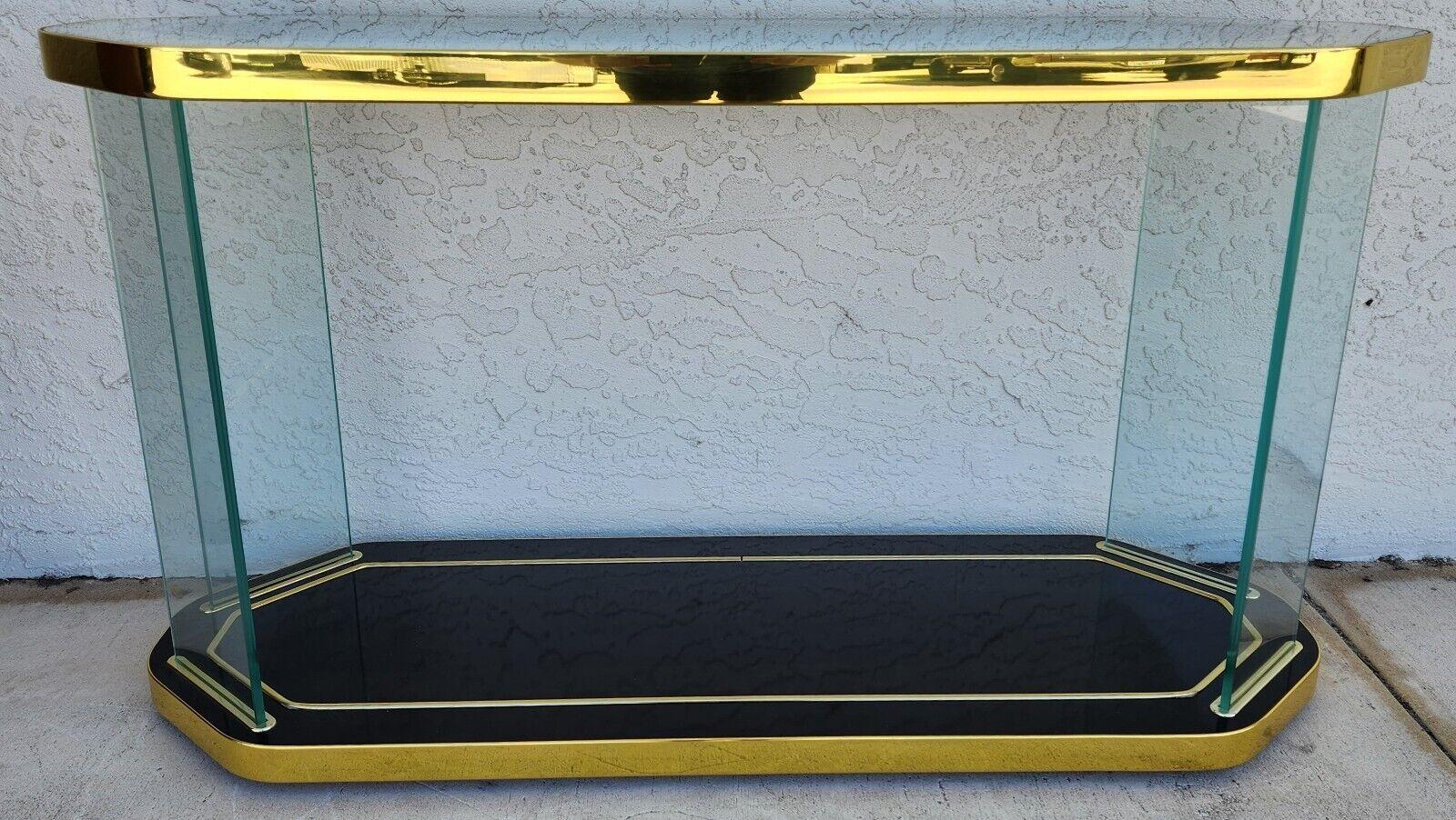 For FULL item description click on CONTINUE READING at the bottom of this page.

Offering One Of Our Recent Palm Beach Estate Fine Furniture Acquisitions Of A
Hollywood Regency Art Deco 1980s Vintage Rolling Console Dry Bar by Silver Furniture