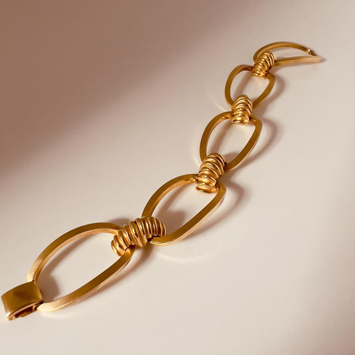 A wonderfully contemporary Vintage Amerikaner Bracelet. Crafted in brushed gold with a timeless style, the ultimate jewel box hero.

An unsigned beauty. A rare treasure. Just because a jewel doesn’t carry a designer name, doesn’t mean it isn't