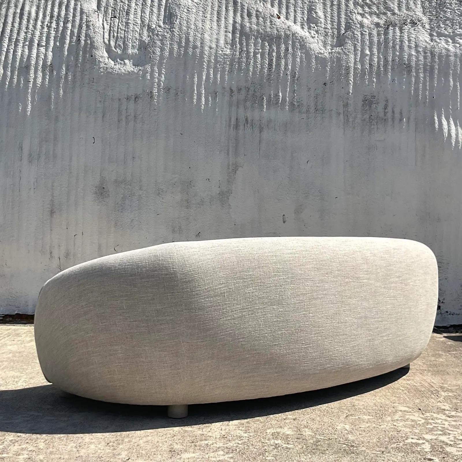 An incredible vintage custom Contemporary sofa. Made by the iconic Ferrell Mittman. Beautiful pale grey boucle in a chic curved shape. In pristine condition. Acquired from an amazing Palm Beach estate.