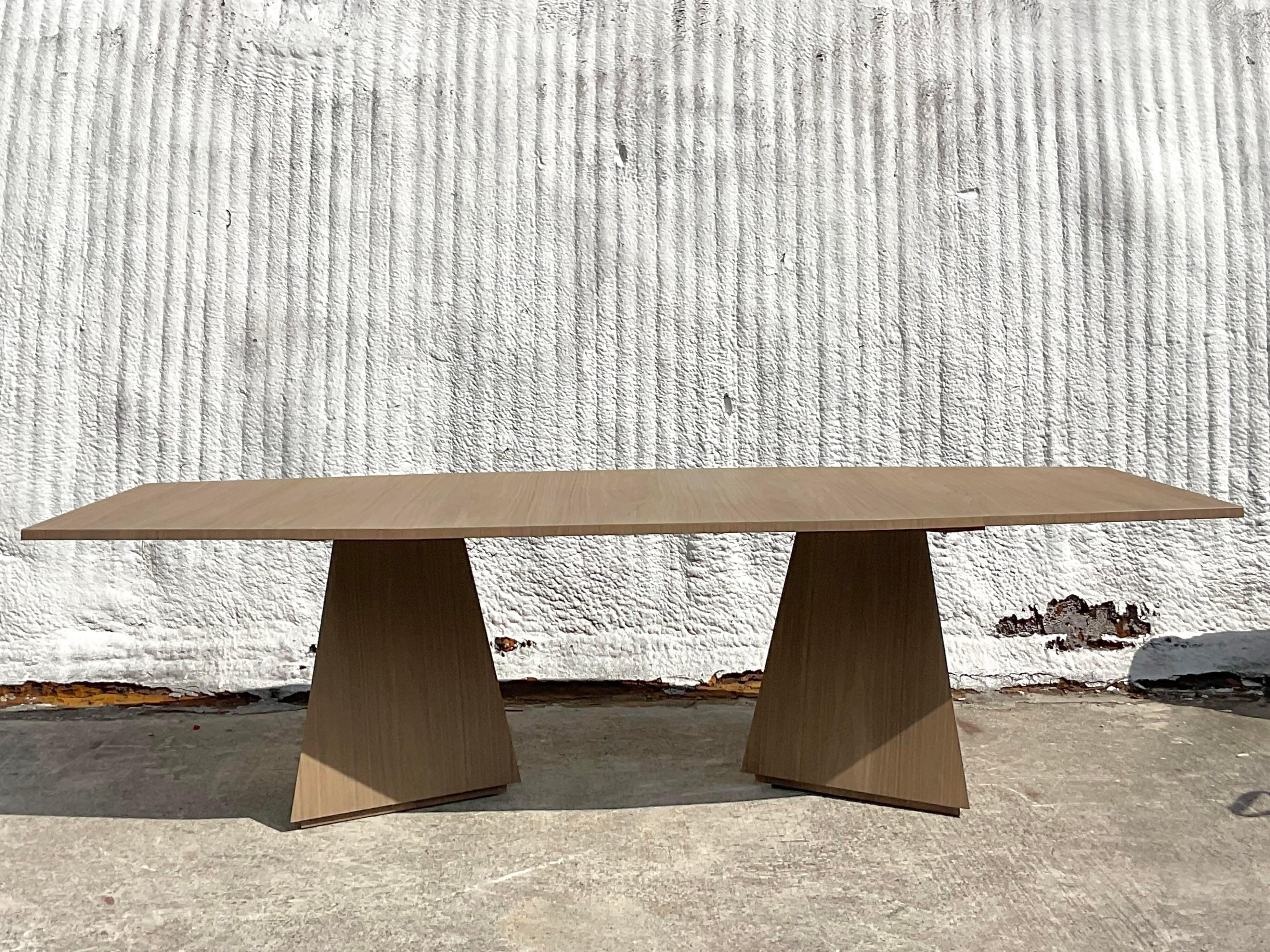 An extraordinary vintage Contemporary dining table. The “Divine” style by the Keith Fritz. A beautiful faceted design in a chic cerused finish. Acquired from a Palm Beach estate.