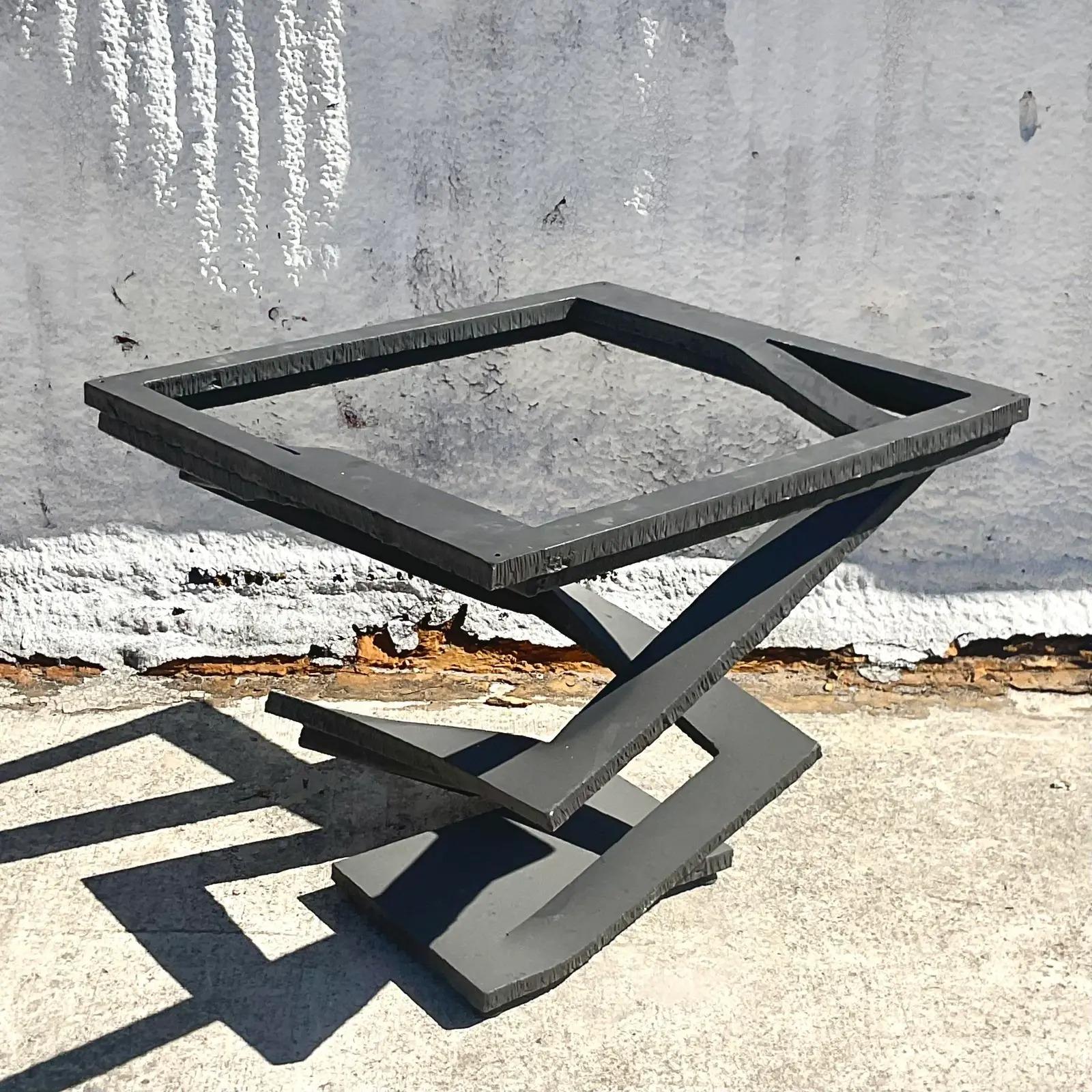 A fantastic vintage contemporary dining table pedestal. Made by the iconic Roche Bobois group in Italy. Part of their “Fleur De Fer” collection. Designed by Maurice Barilone. Torch cut steel and wrought iron. Acquired from a Palm Beach estate.