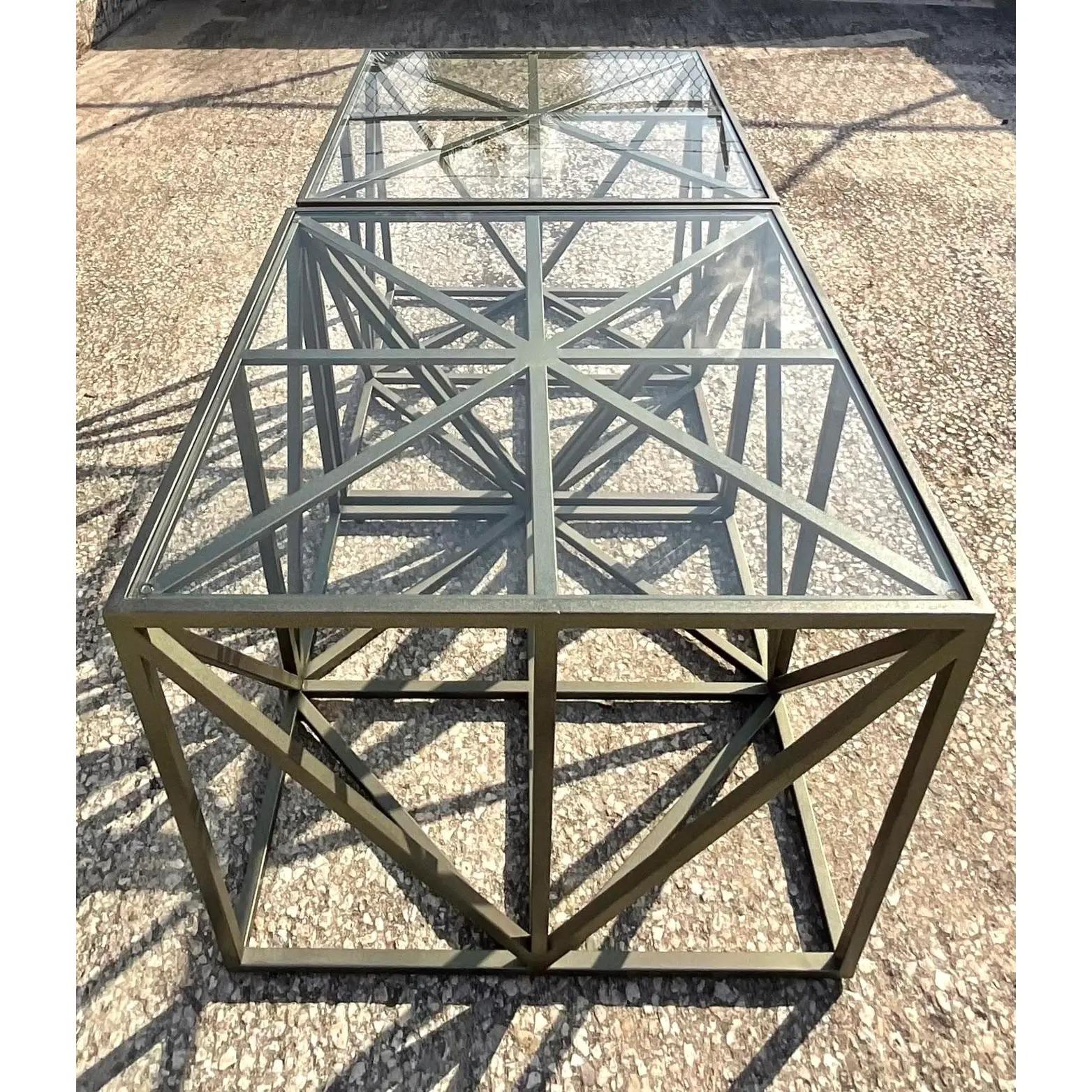 Fantastic vintage Contemporary side tables. Beautiful girder design with inset glass top. Matching coffee table also available. Acquired from a Palm Beach estate. 