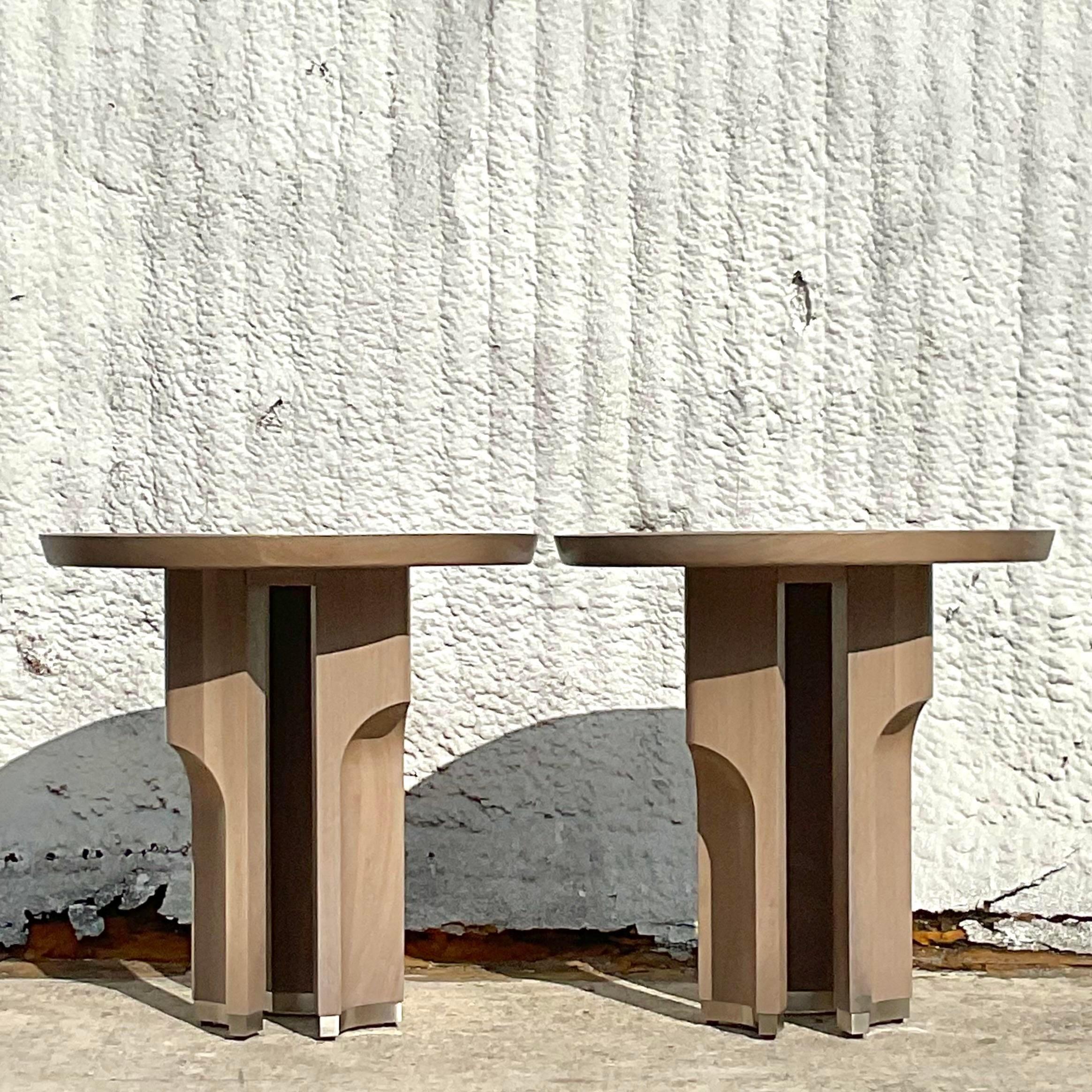 An exceptional pair of vintage Contemporary side table. Handmade by the Hellman Chang group. Signed and numbers plaque on the bottom. The Fountain style in a heathered walnut with brushed nickel plinth. Acquired from a Palm Beach estate.