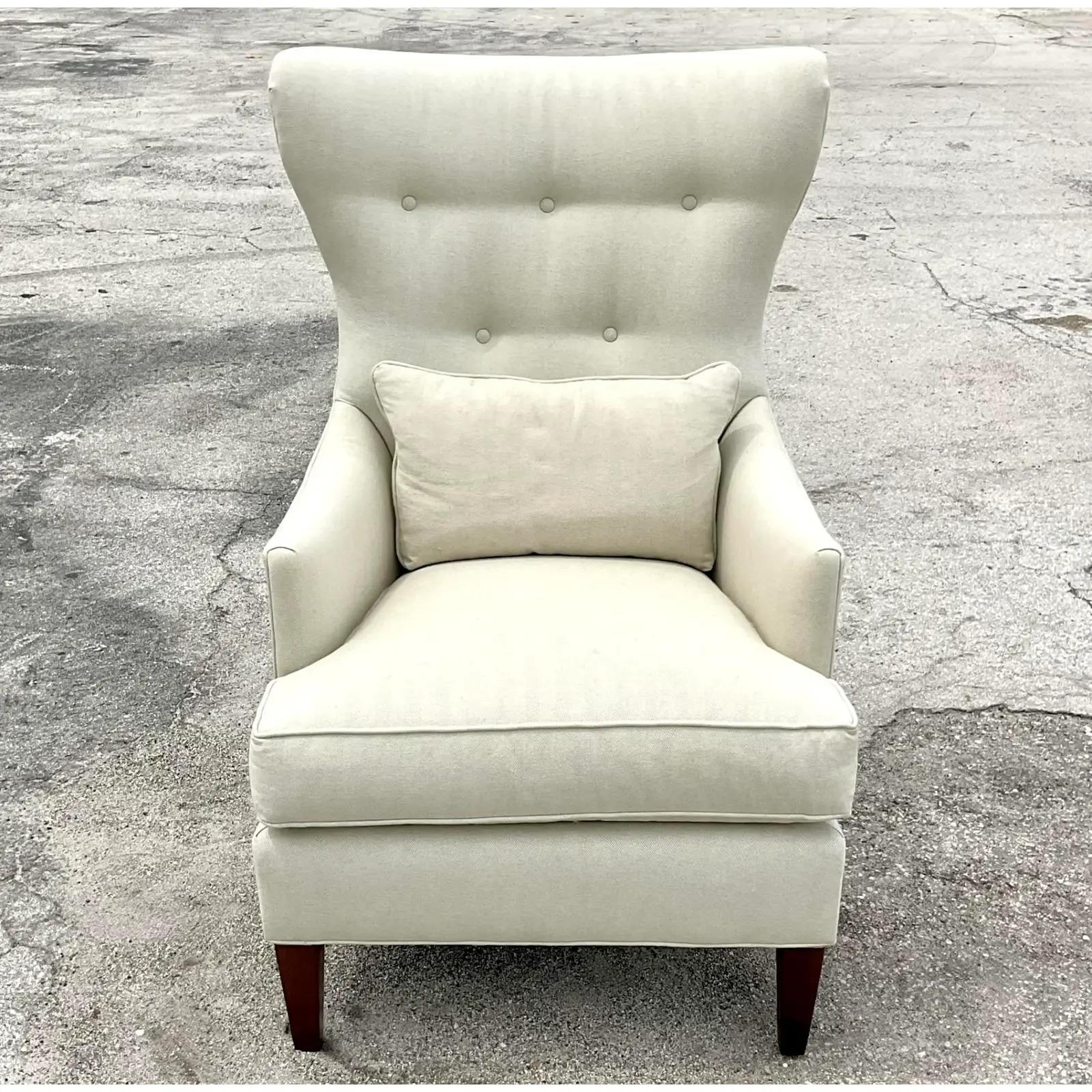 Fantastic vintage Contemporary wingback chair. A chic Contemporary take on a classic shape. Made by the Huntington House group in North Carolina. Beautiful felted Calvary twill upholstery. Acquired from a Palm Beach estate.