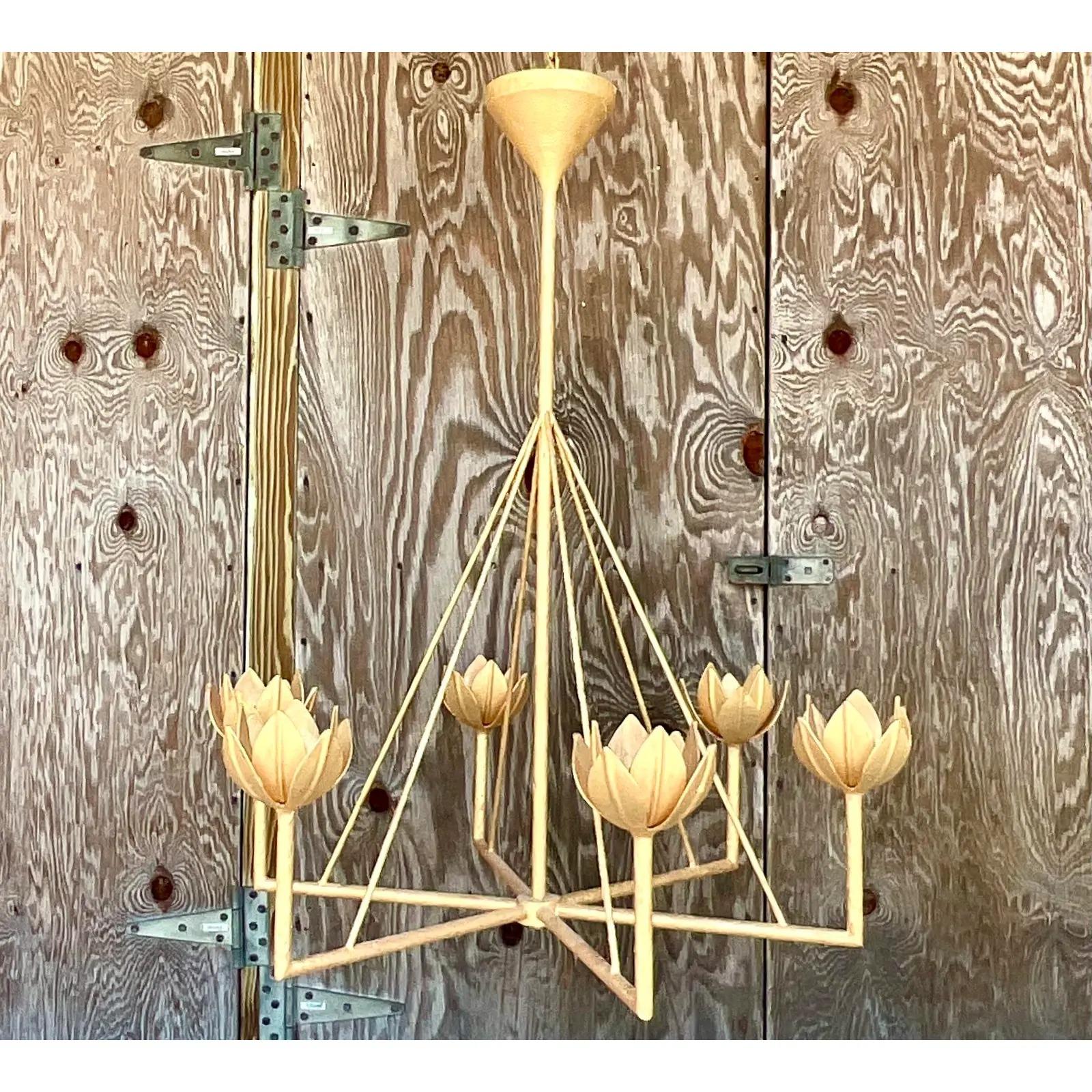 Fantastic vintage Contemporary six arm chandelier. Beautiful Julie Neill design with a lotus flower arm and antiqued gold finish. A striking look. Acquired from a Palm Beach estate.

Up to 120V (US Standard)Hardwired

The chandelier is in great