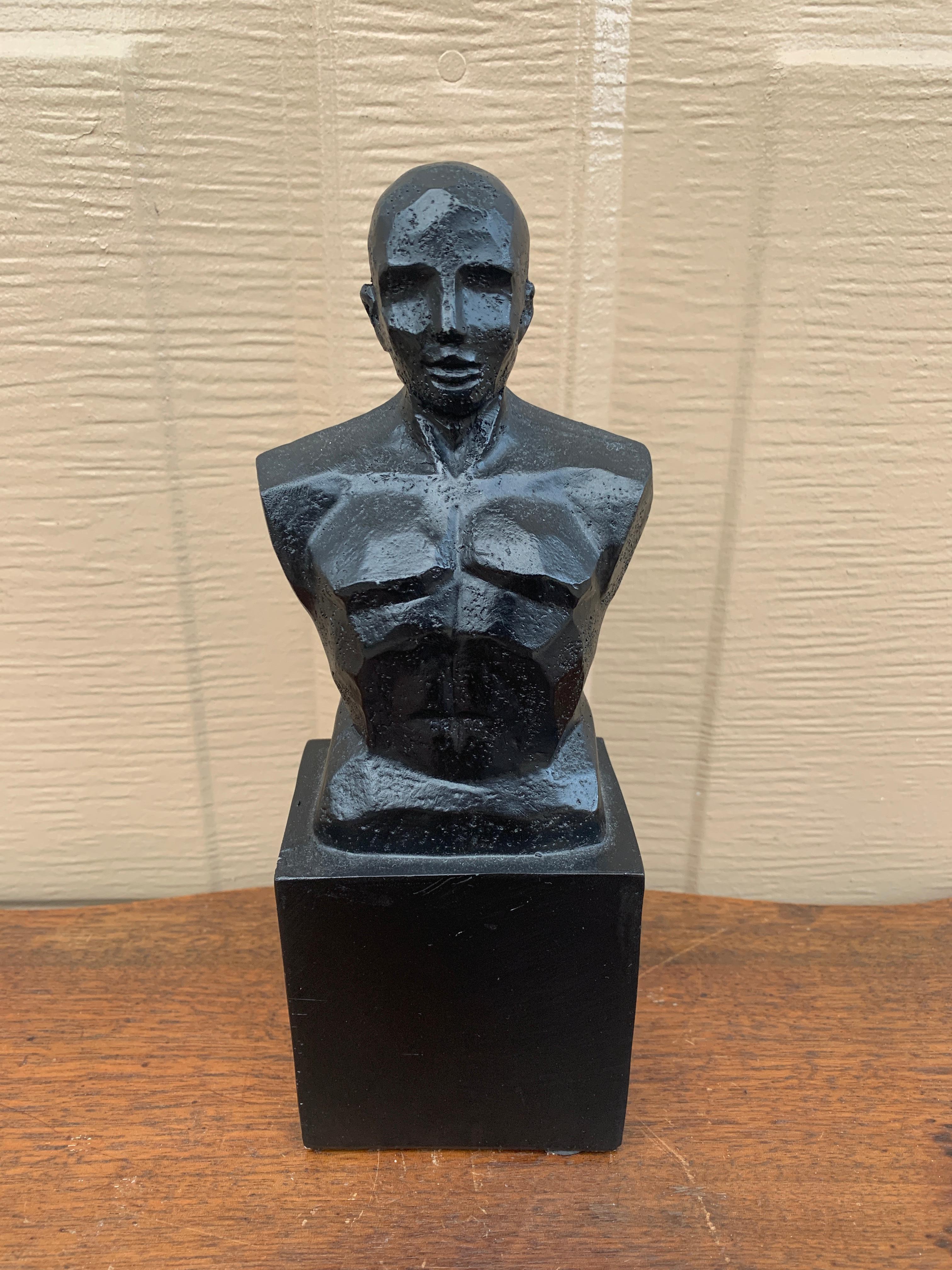 A gorgeous contemporary black resin male head and torso bust sculpture

USA, Late 20th Century

Measures: 3.25