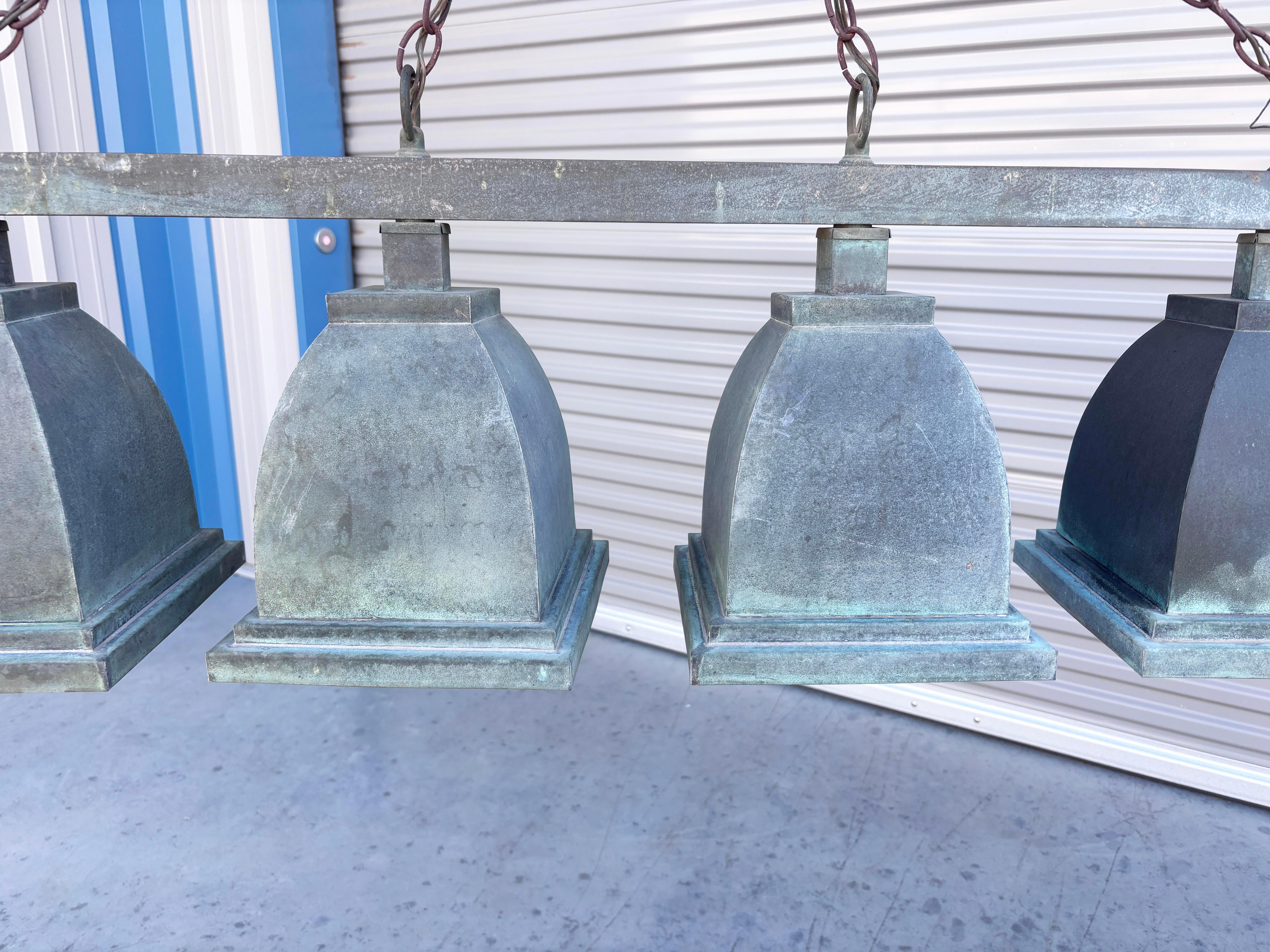 Lámpara de cobre vintage de cuatro luces Metalistería en venta