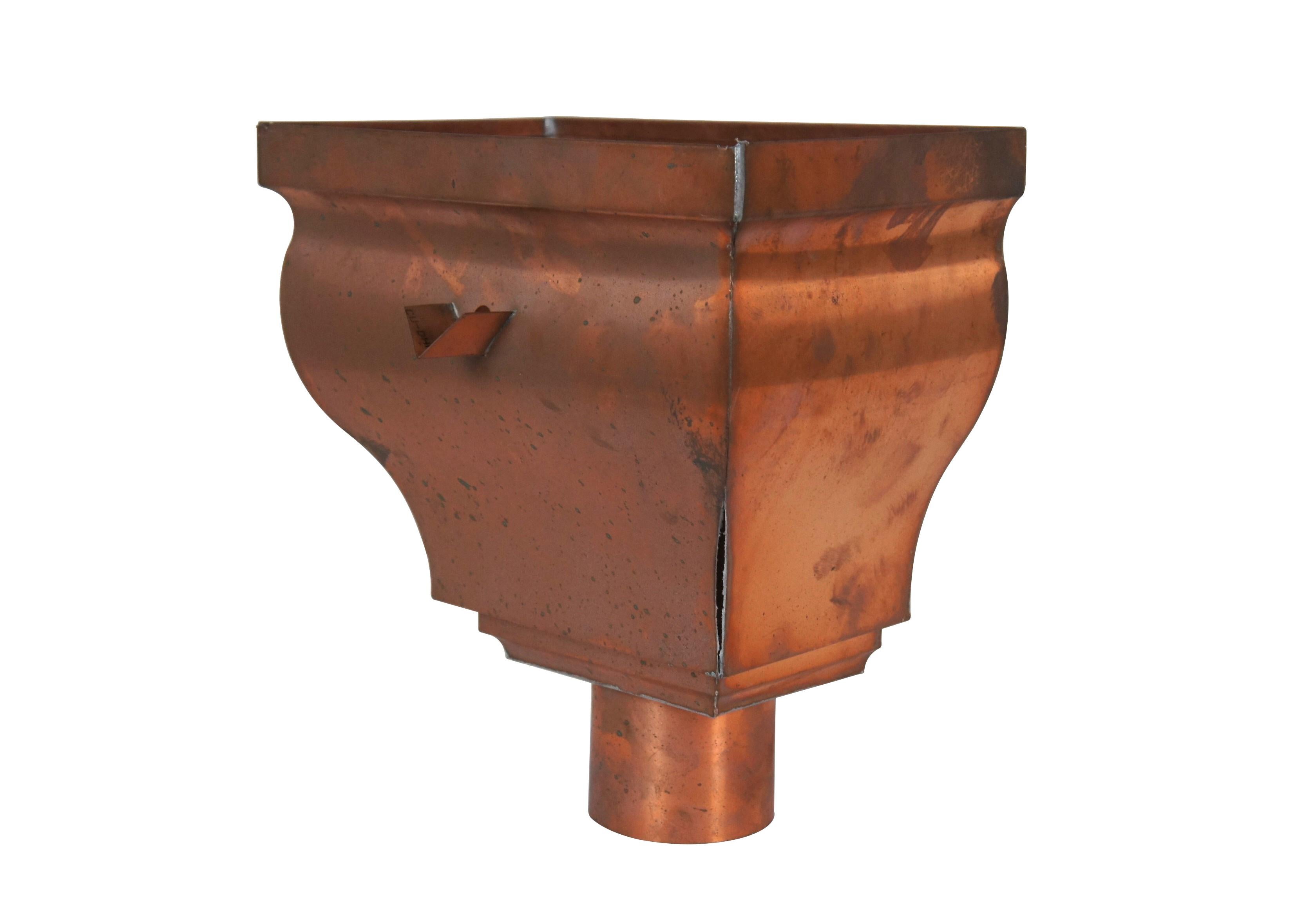 Late 20th century copper gutter leader head / leader box / hopper with triangular overflow spout. Possibly a Minoletti Deluxe. Stamped CU-DHP R24. Base Diameter 4