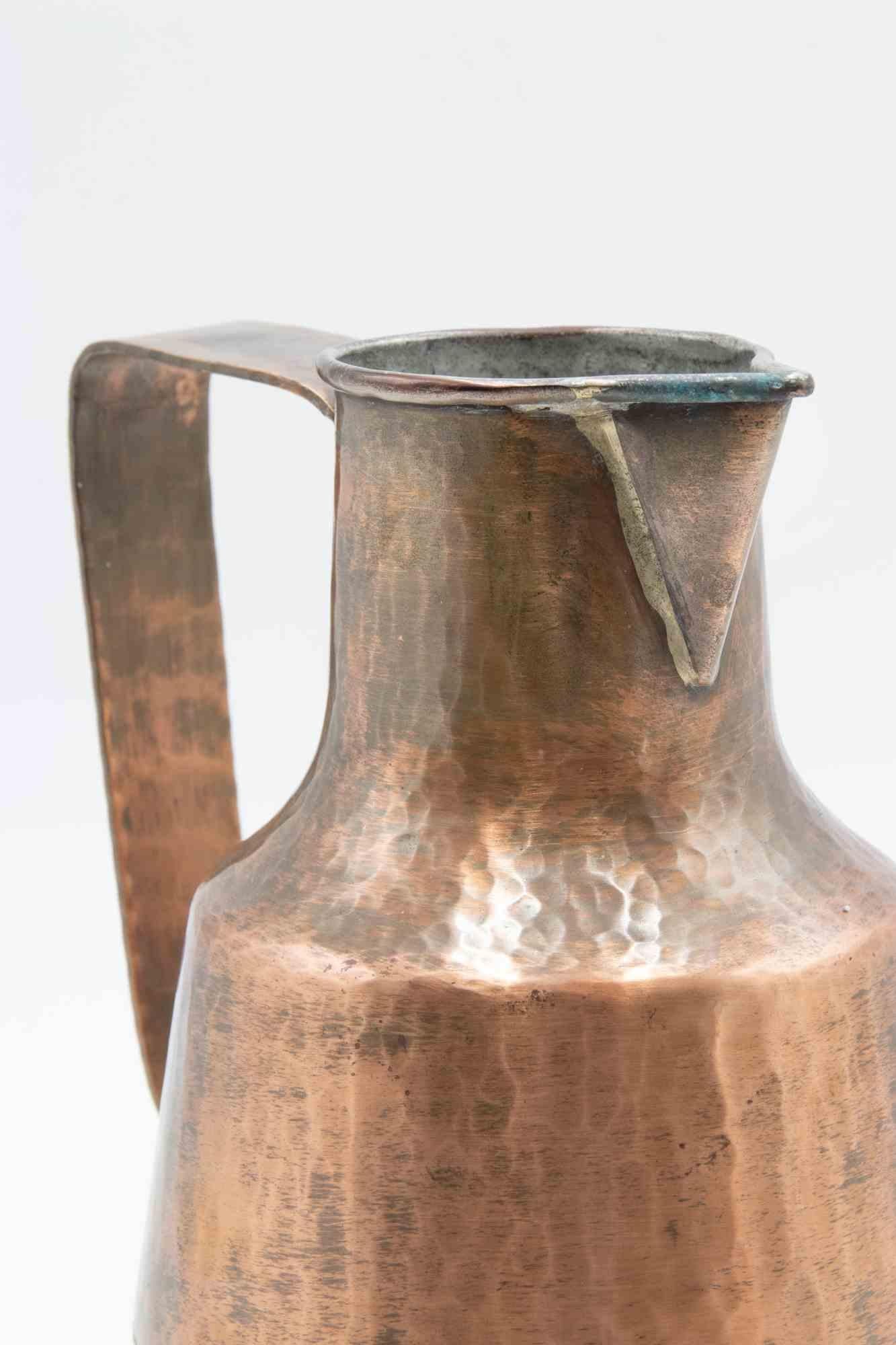 Jarra vintage de cobre realizada por el diseñador de la Bauhaus Eugen Zint.

Hallmark en la parte inferior.

Muy buen estado.