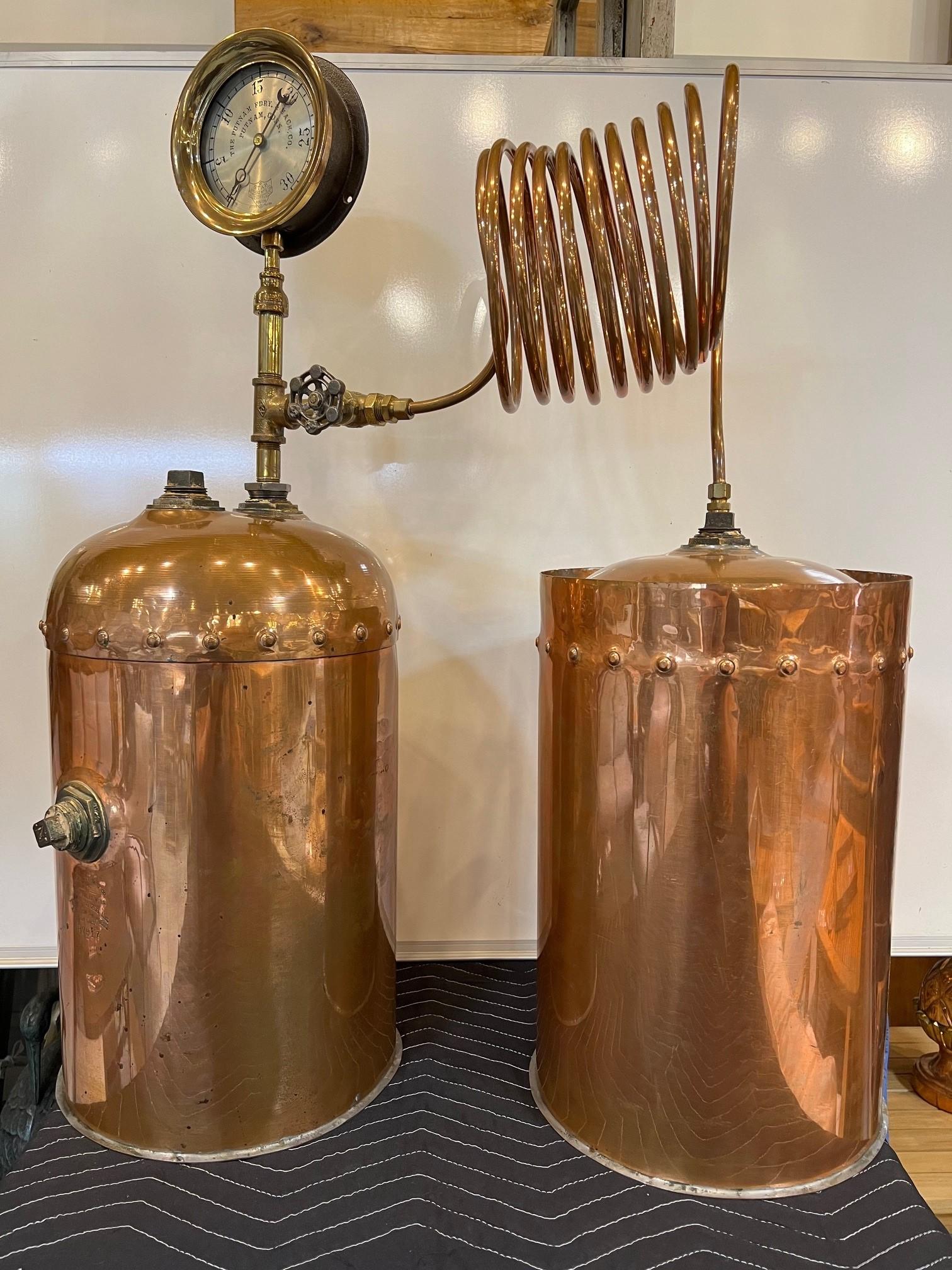 Antique copper moonshine or whiskey distillery is a 25 gallon signed by Dahlquest Manufacturing Company Somerville Mass and presser dial by The Putnam FDRY from Putnam CT. This is a fantastic piece perfect for the whiskey lover. Also a great display