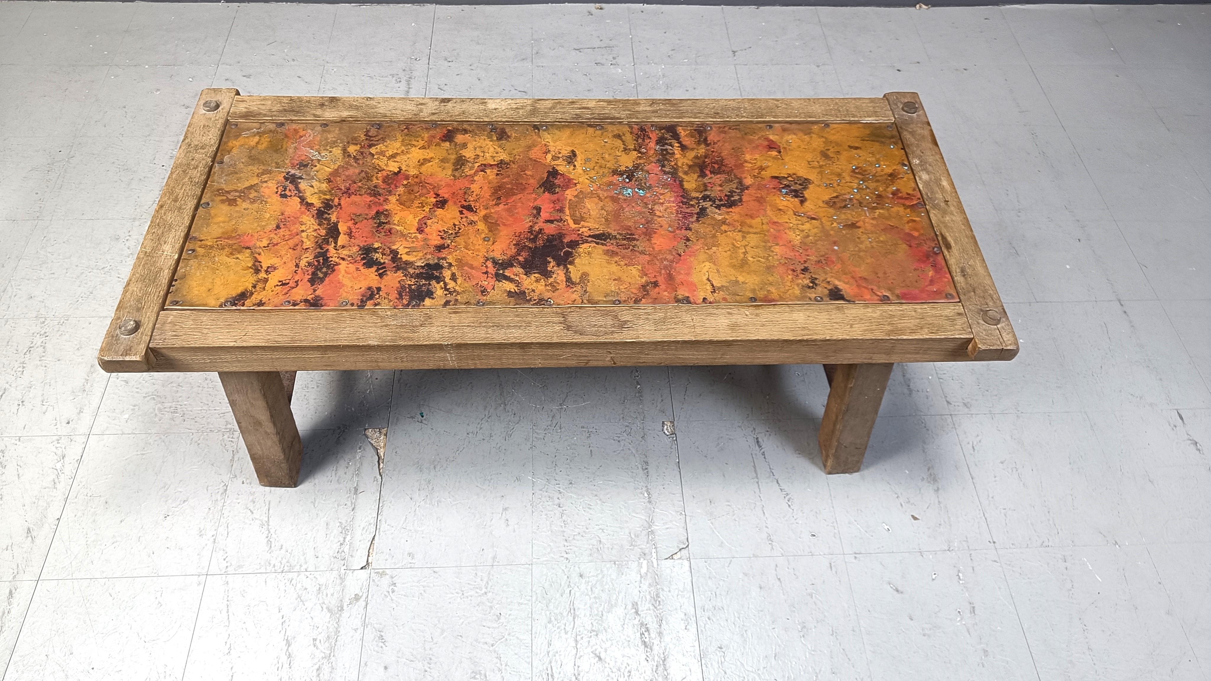 Rustic copper plated coffee table with a nice solid wooden frame.

Good condition

1970s - Germany

Dimensions:
Height: 50cm
Width: 145cm
Depth: 65cm

Ref.: 25021402