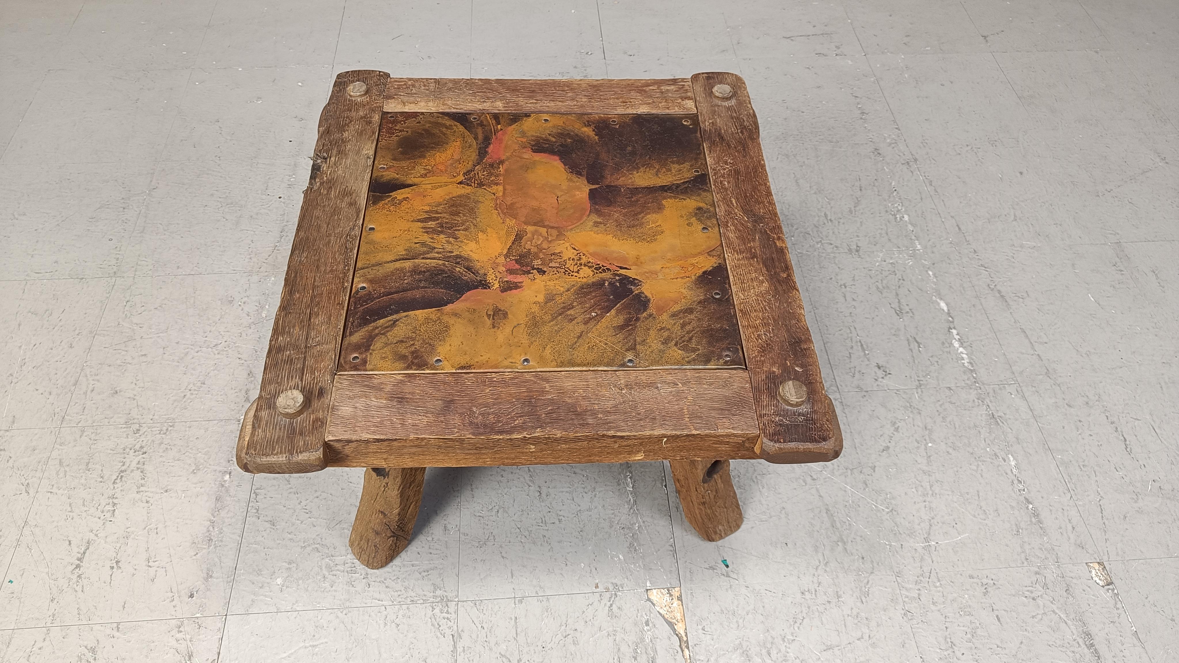 
Rustic copper plated coffee table with a nice solid wooden frame.

Good condition

1970s - Germany

Dimensions:
Height: 40cm
Width x depth: 65cm

Ref.: 2502140202