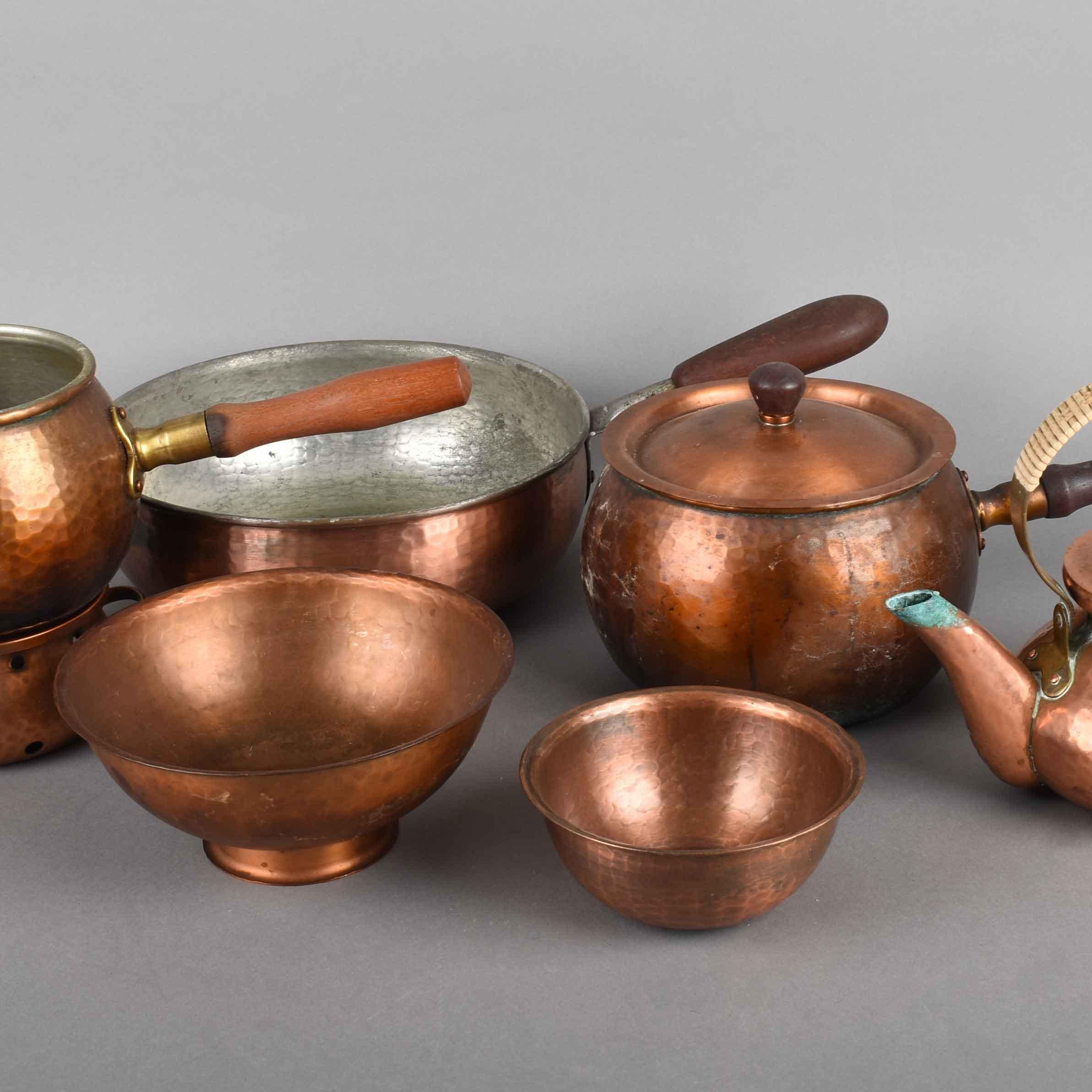 Copper set by Eugen Zint is an original decorative group of objects realized in the 1950s.

Original copper. The group includes seven pieces: two bowls in different sizes, three pots, one teapot and one kettle.

All the objects are realized in