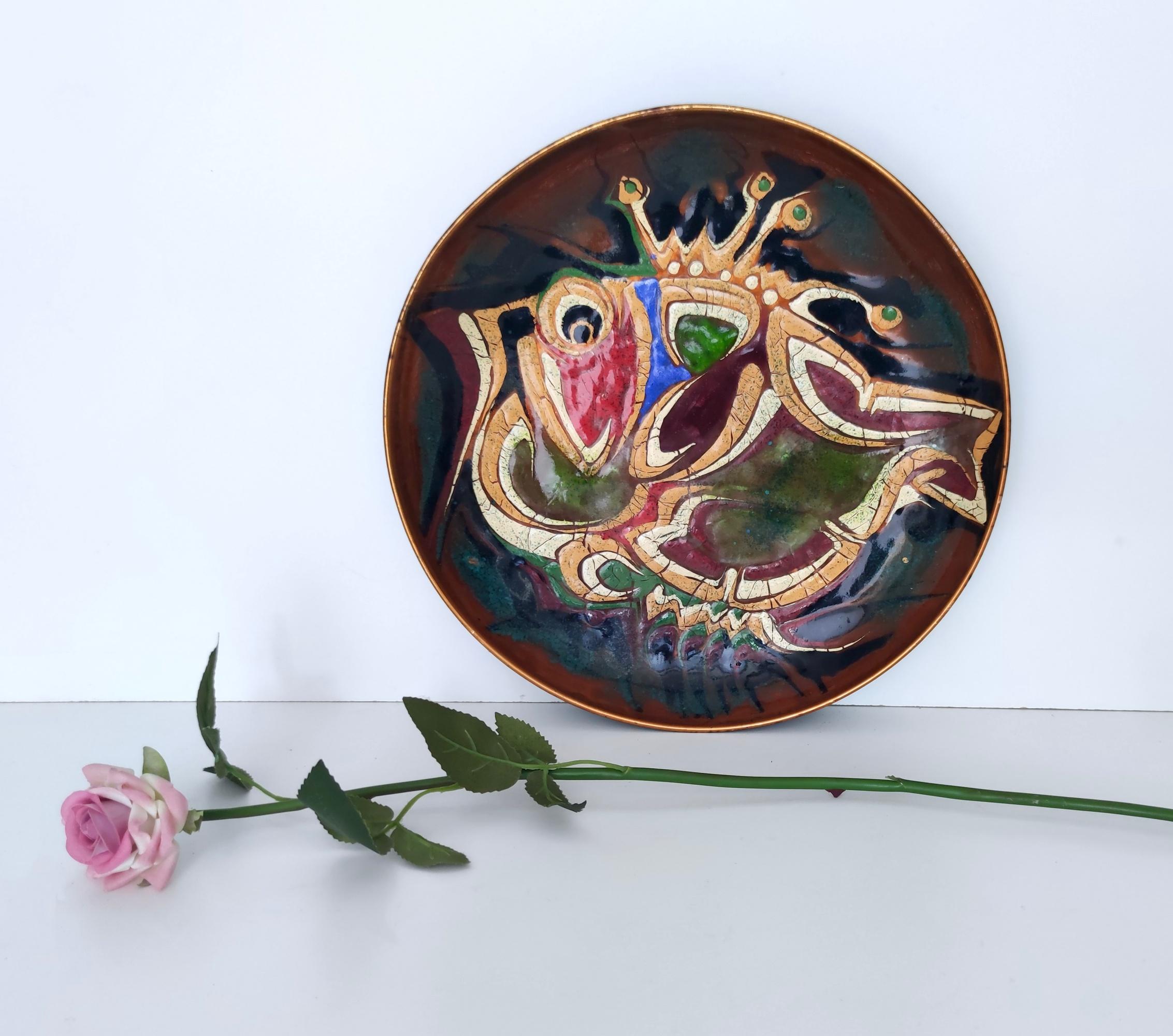 Made in Italy, 1950s. 
This catchall / vide-poche / decorative plate is made in hand-enameled copper and features splendid colors
It is a vintage piece, therefore it might show slight traces of use, but it can be considered as in very good original