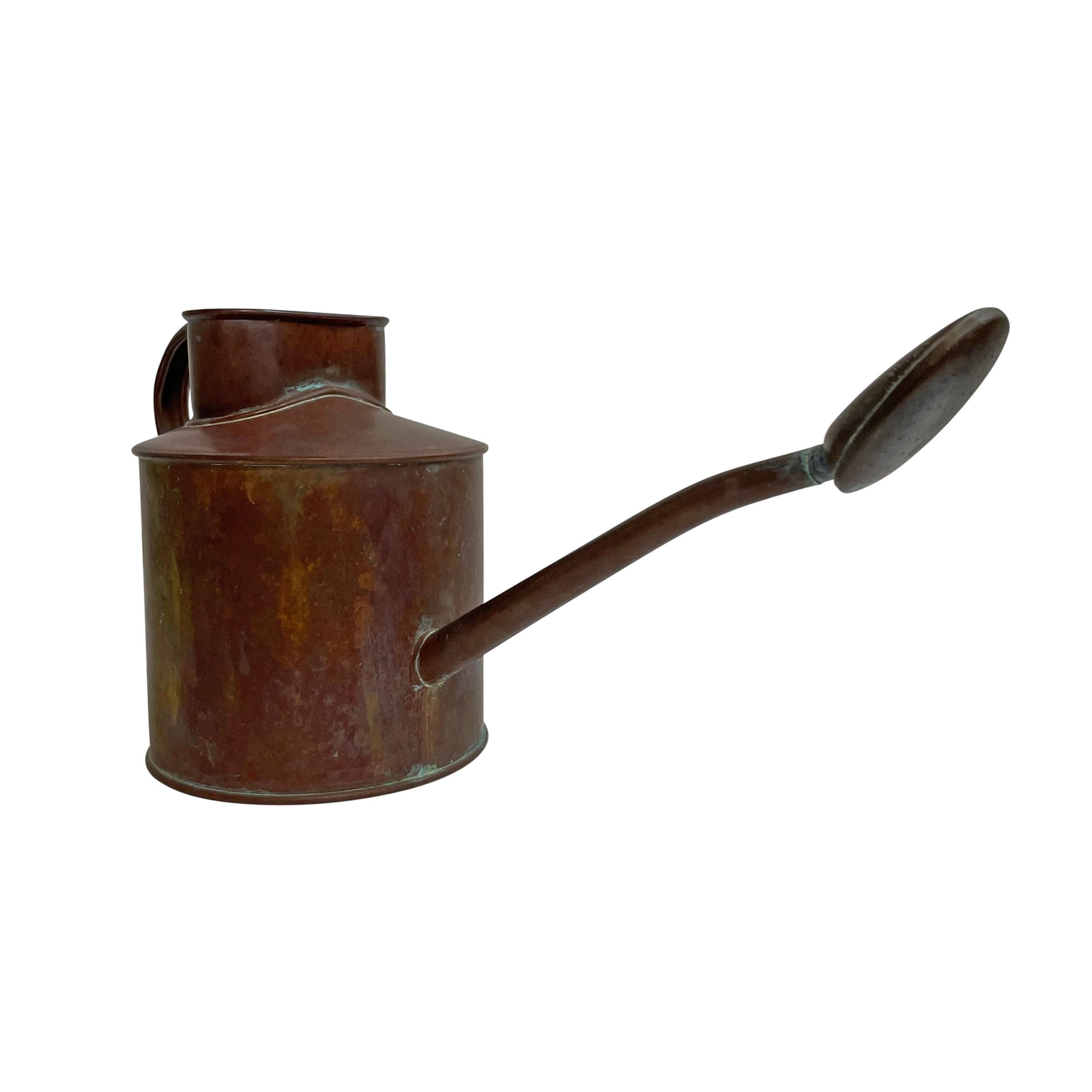 copper watering can vintage