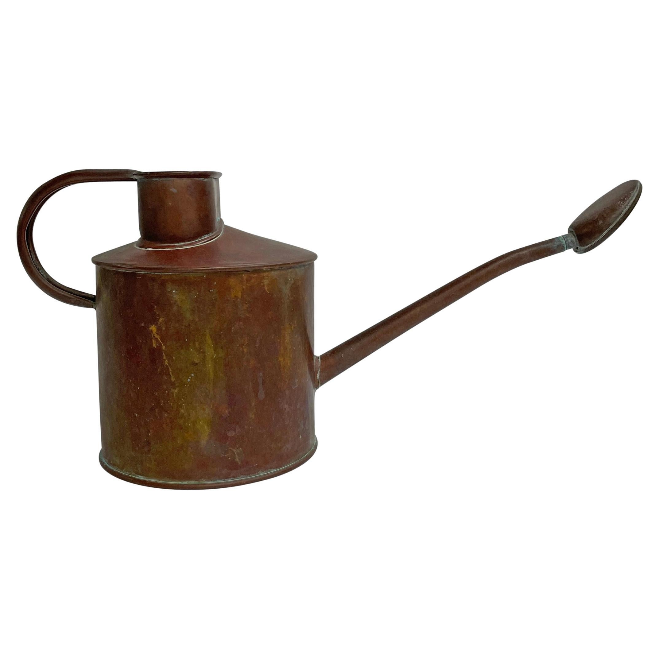Arrosoir vintage en cuivre