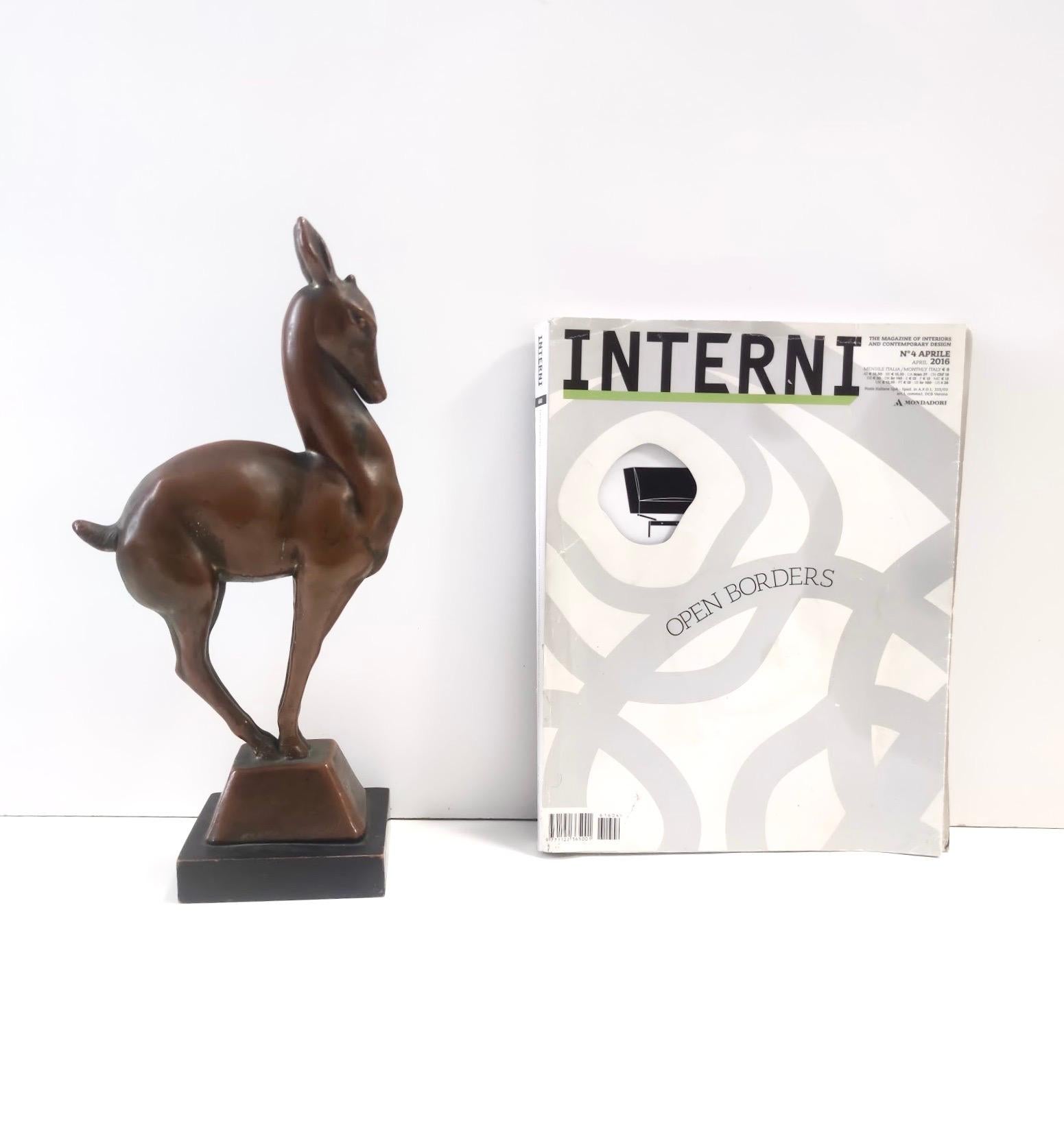 Made in Italy, 1930s - 1940s. 
This roe deer is made in coppered ceramic.
This is a vintage piece, therefore it might show slight traces of use, but it can be considered as in excellent original condition and ready to become a piece in a