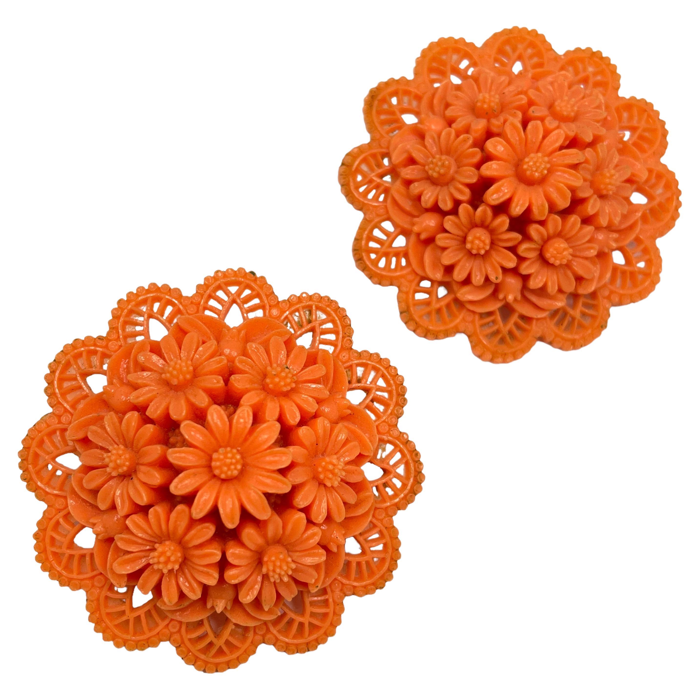 Vintage coral celluloid flower clip on earrings For Sale