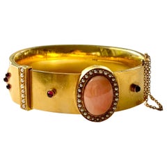 Vintage Coral, Garnet and Seed Pearl 14 karat Yellow Gold Bangle Bracelet