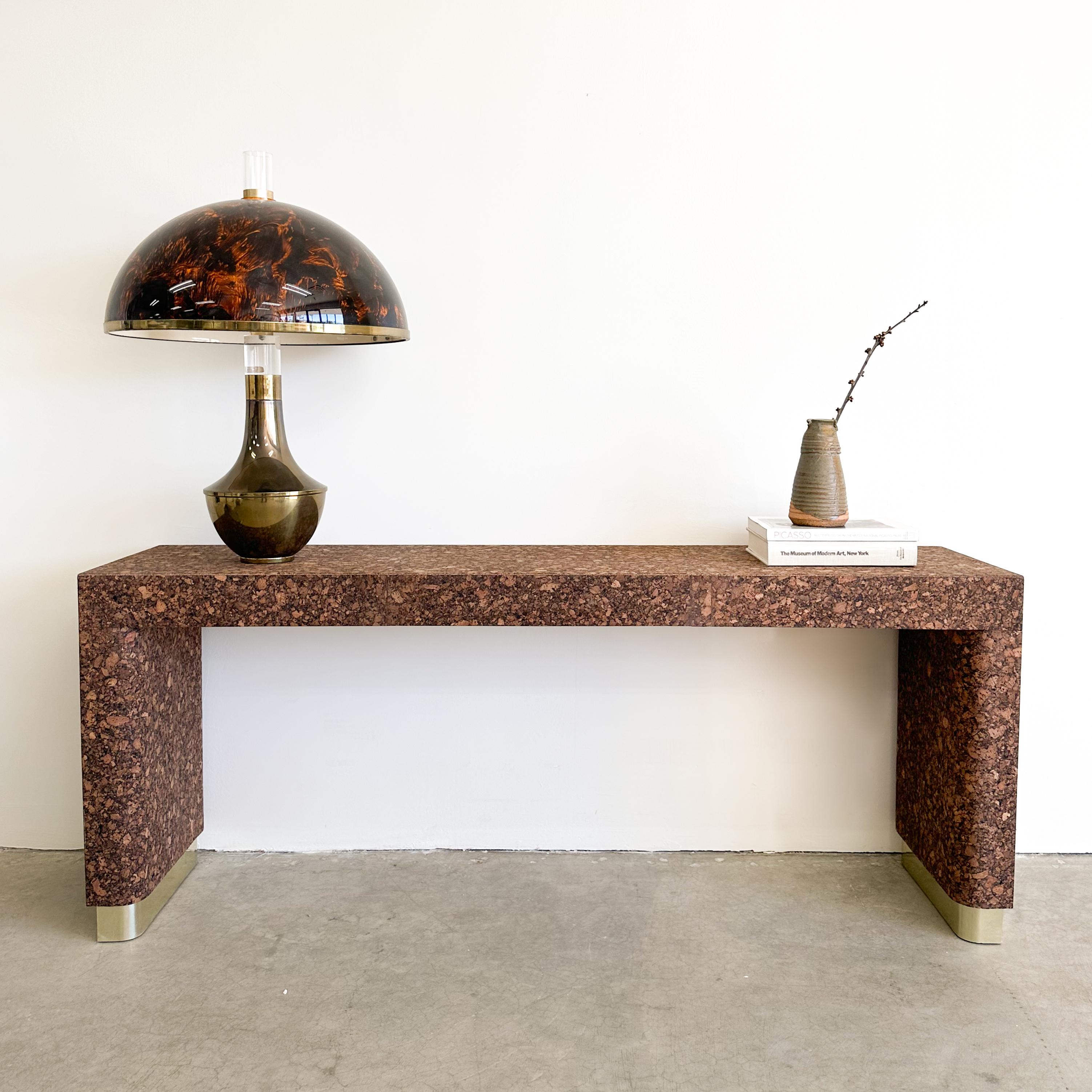 Vintage Cork & Brass Console.

Color: Cork/Similar to burl wood in color.

Measurements:
Width: 72 1/4