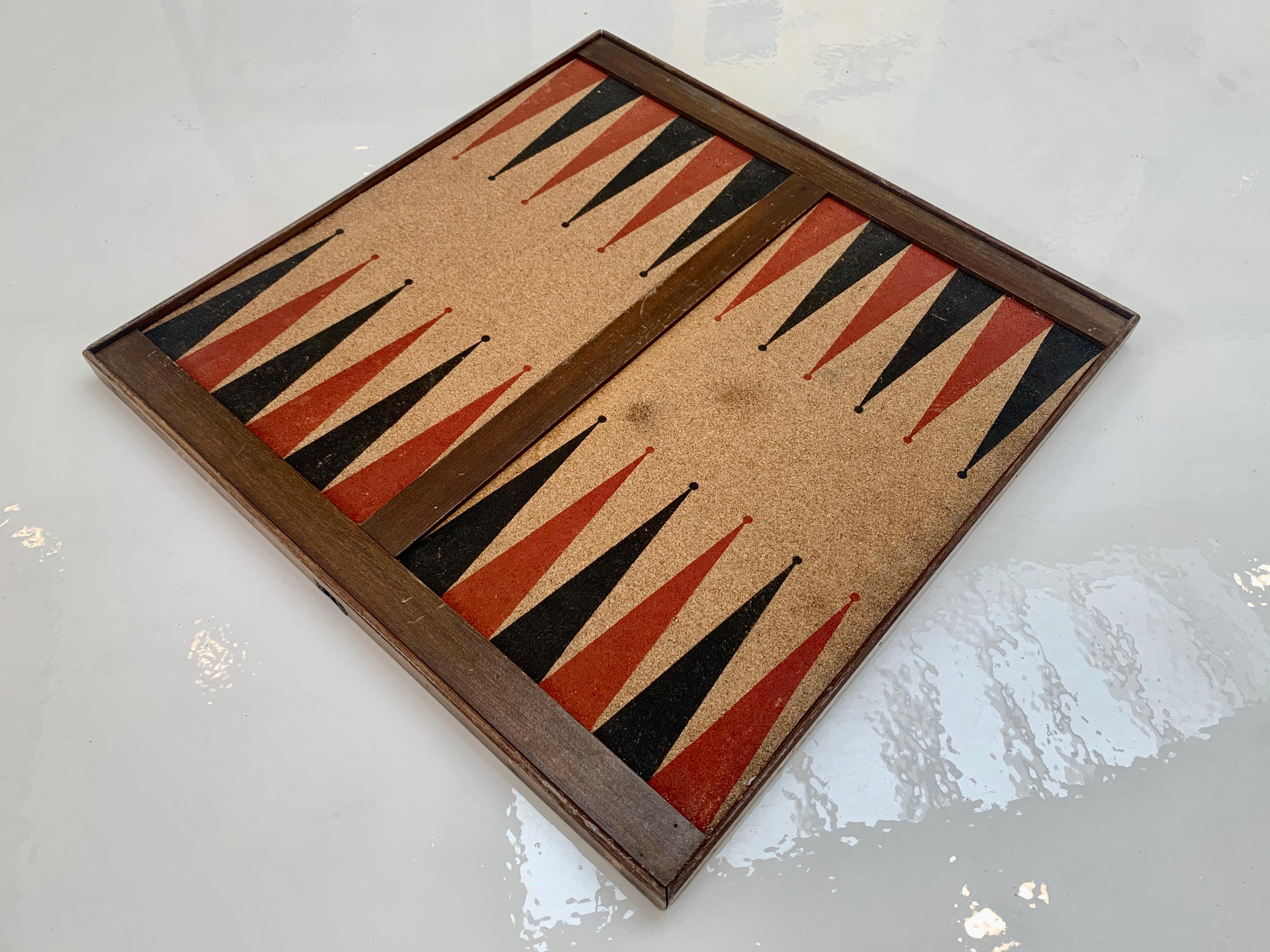 Vintage game board with backgammon on one side and chess on the other. Sturdy wood framed board. Wood chess game board with cork backgammon game board on the reverse side. Good vintage condition.