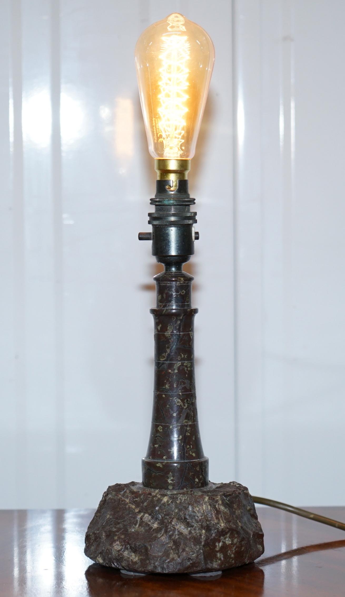 We are delighted to offer for sale this lovely vintage Cornish Serpentine marble lighthouse table lamp with bakelite fitting

A very good looking decorative table lamp, its highly detailed and would look good in any setting