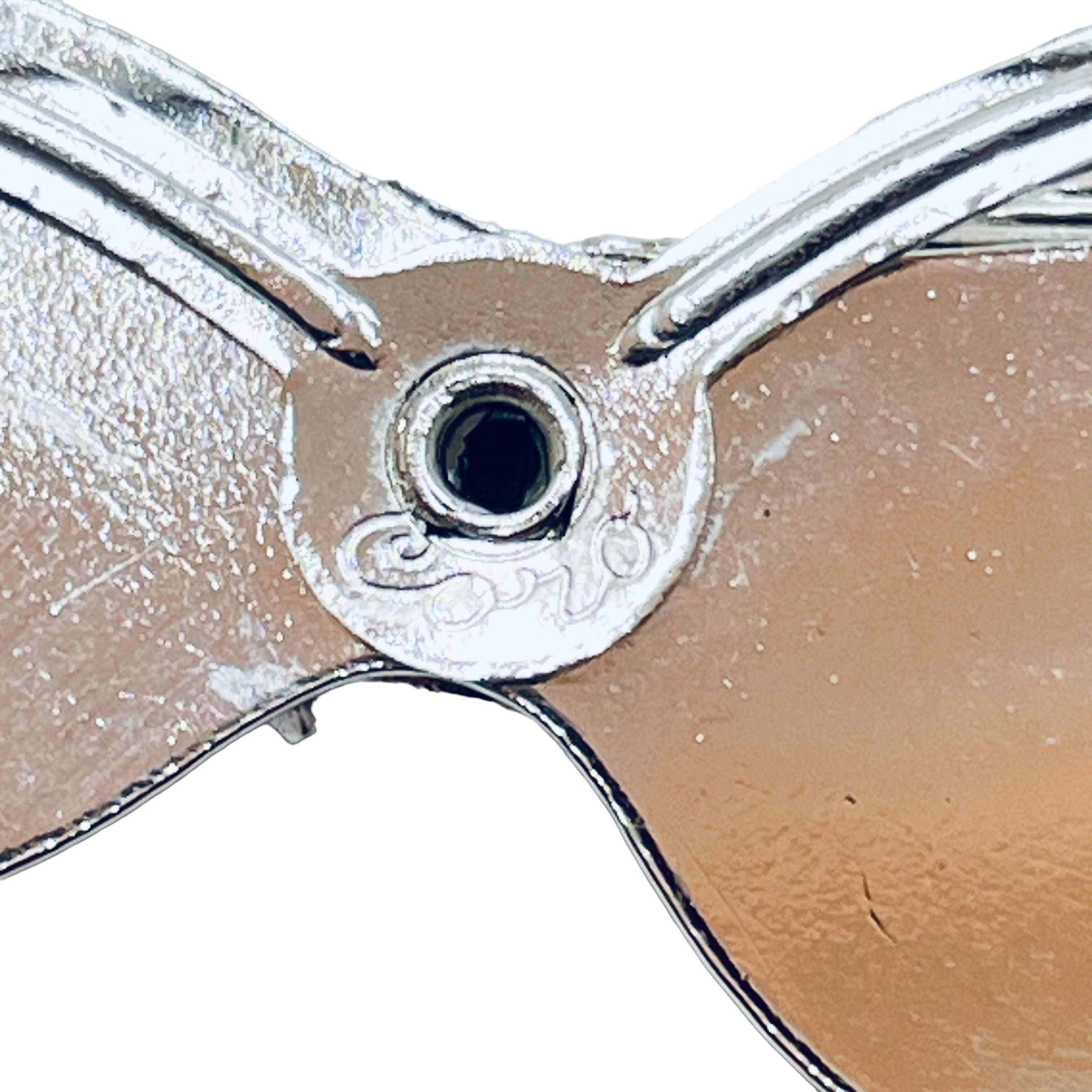 Women's or Men's Vintage CORO bow silver rhinestone designer pin brooch For Sale