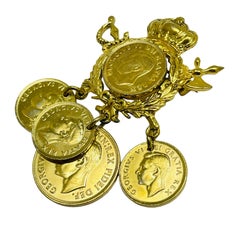 Vintage CORO gold crown sword coin dangle designer brooch