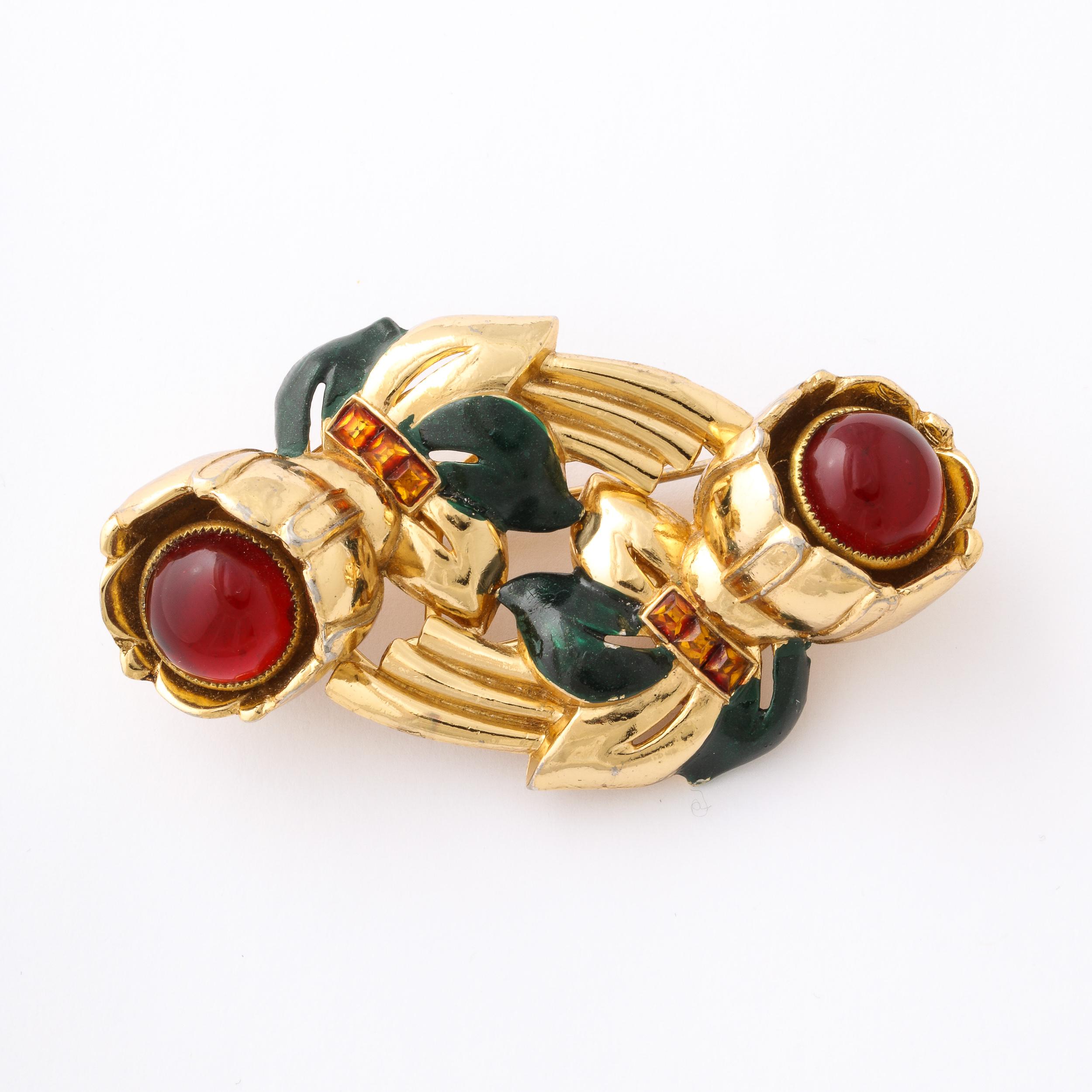 This Duette Camellia Brooch by Coro, set designed by Gene Verri was patented in the United States in 1938. From one of the foremost makers of American costume Jewelry in the Early 20th Century, the brooch serves as a gorgeous example of the