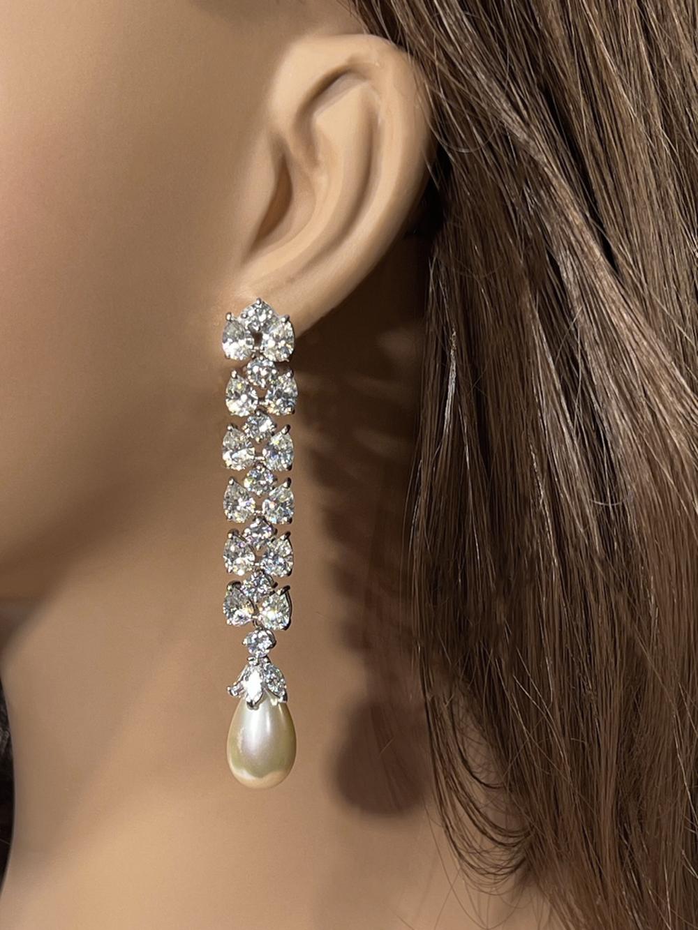 Vintage Costume Jewelry Diamanté Pearl Sterling Long Dangly Earrings Made With Diamond Quality Pear Shaped Cubic Zirconia and ManMade Pearls Stunning flexible 3.5 inches long for pierced ears.