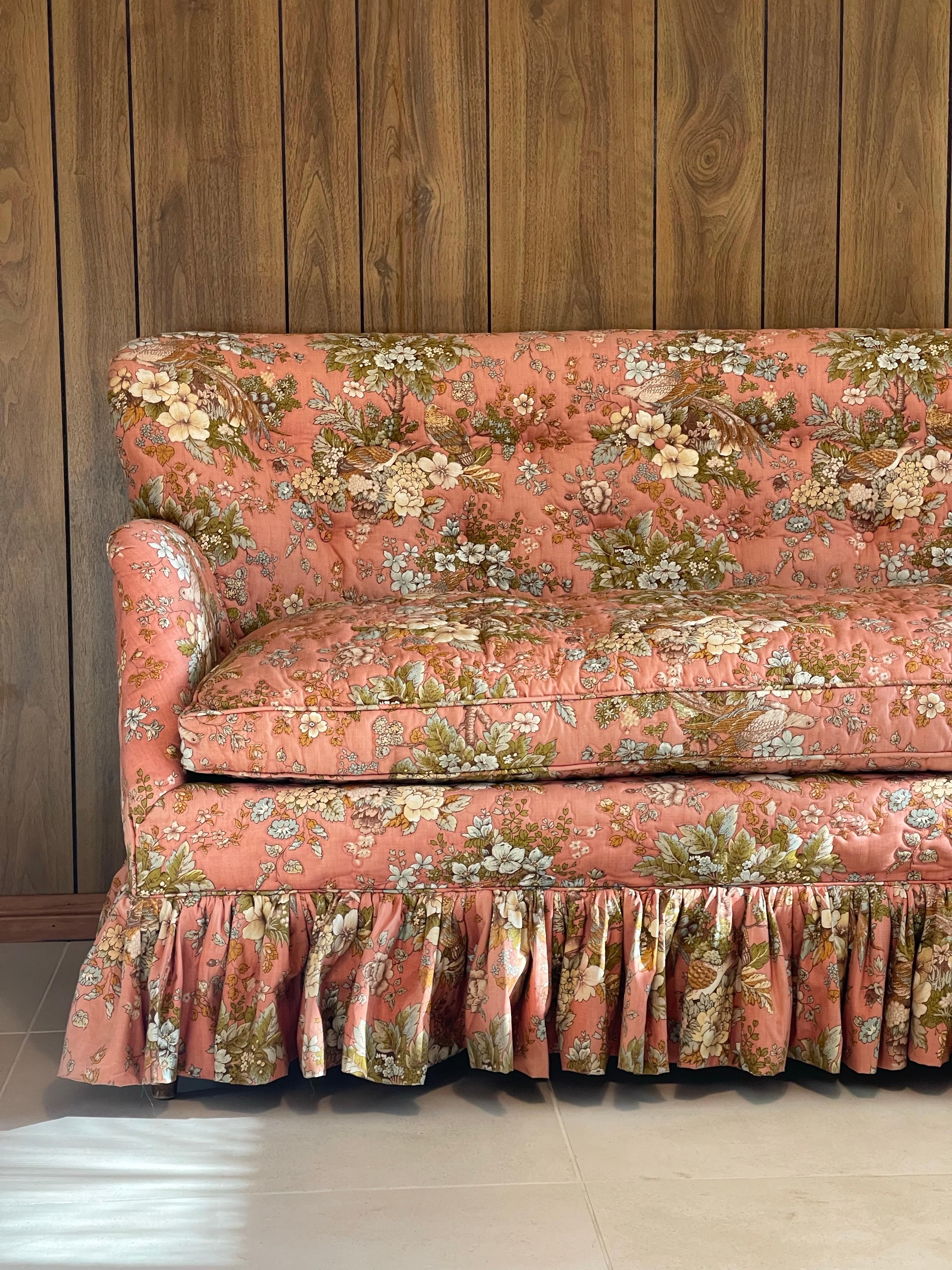 Stunning cottage style love seat with a frilled trim. All original stitched, detailed fabric.