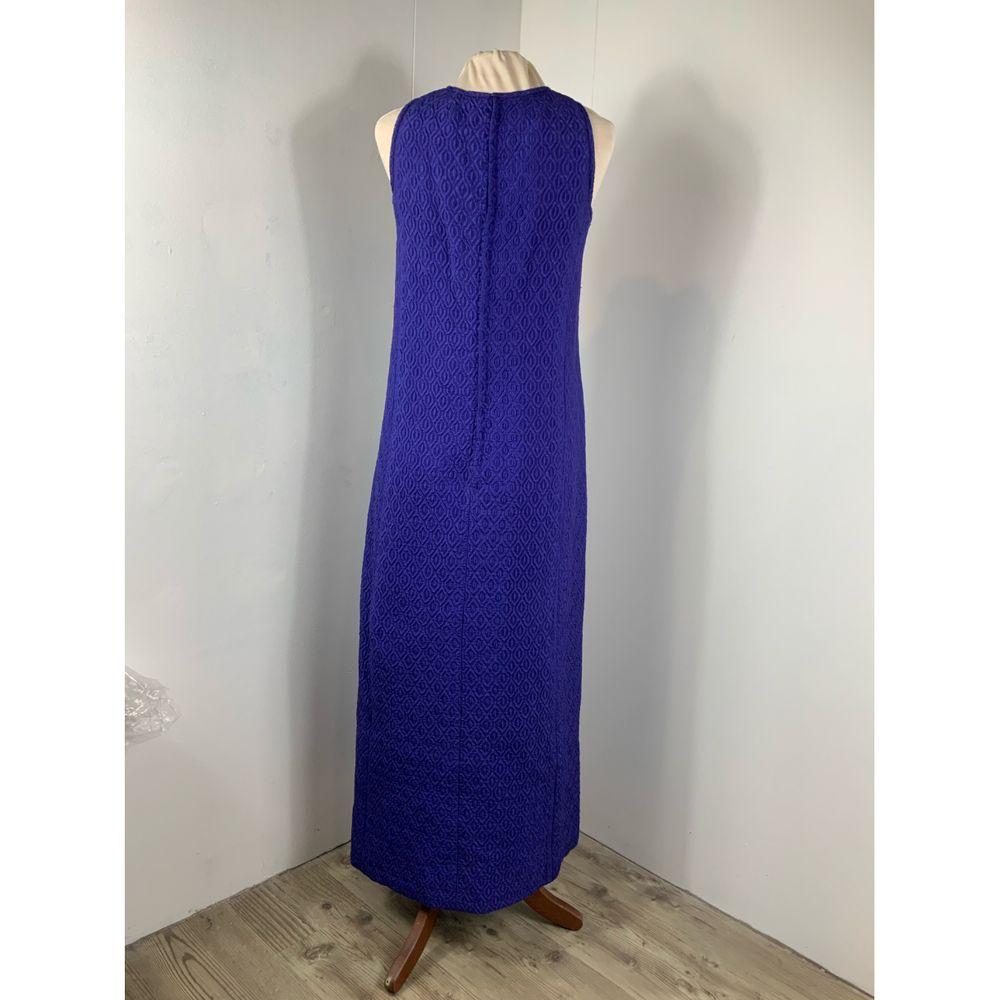 Vintage Cotton Maxi Dress

Vintage dress no logo. 
Size and composition label missing. 
Purple / blue color. 
Fits an Italian 42. 
Measures 24 cm at the shoulders, 42 cm at the bust, 130cm in length. Excellent general condition, shows signs of