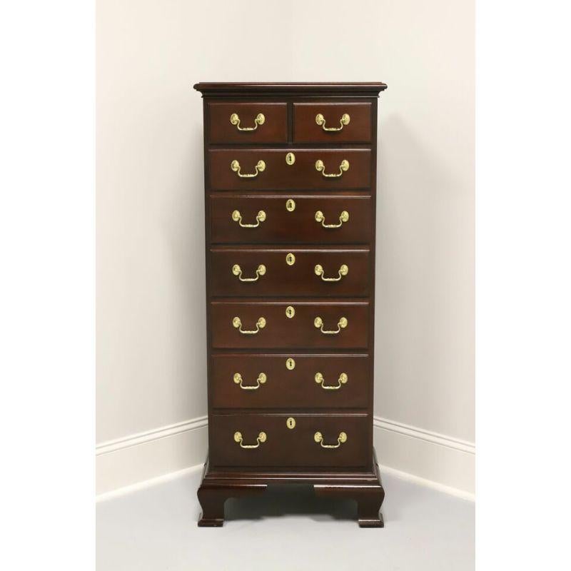 A Chippendale style lingerie chest by Councill. Solid mahogany with brass hardware and ogee bracket feet. Features two smaller over six larger dovetail drawers with faux keyhole escutcheons. Made in North Carolina, USA, in the late 20th