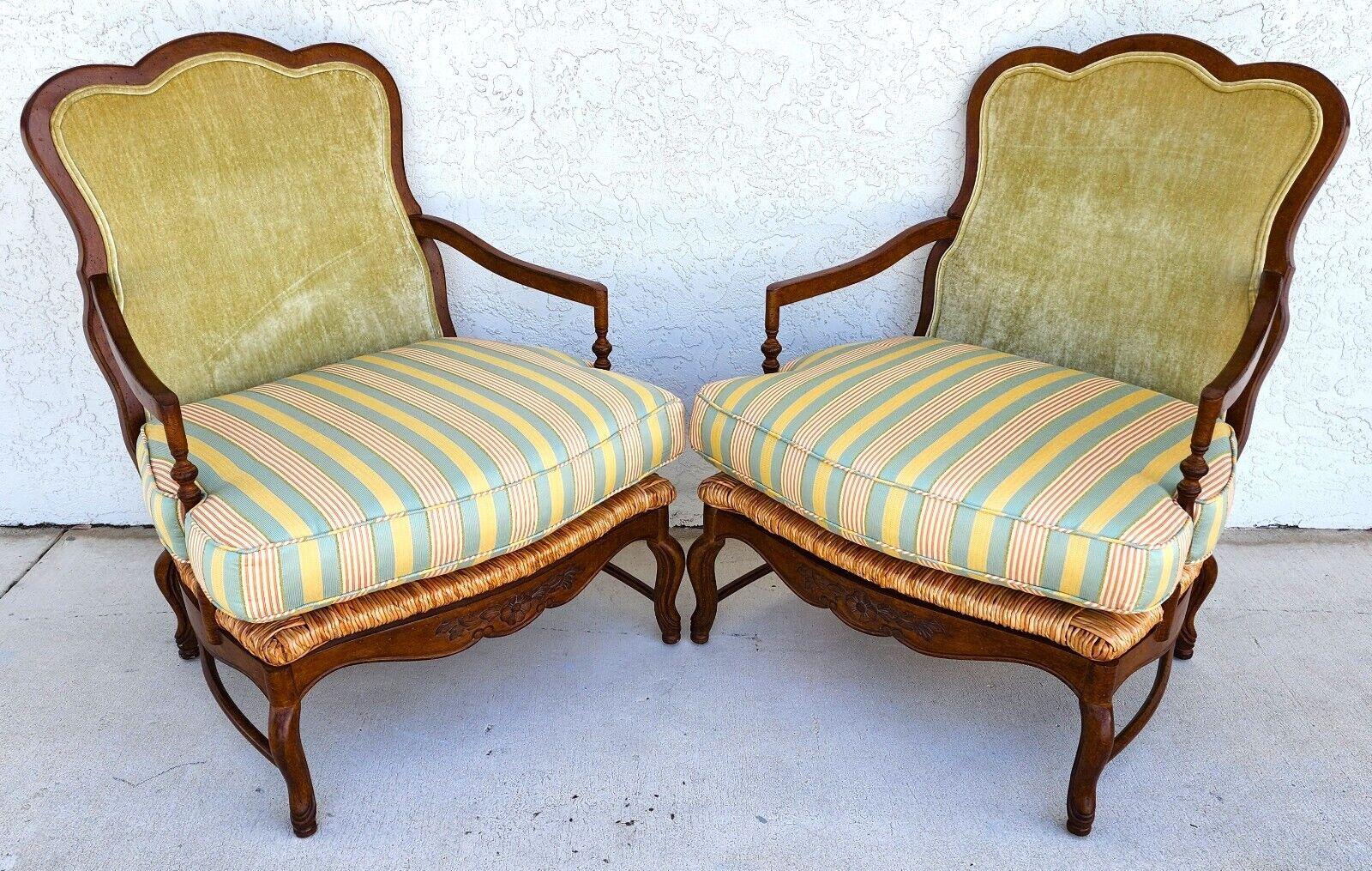 For FULL item description click on CONTINUE READING at the bottom of this page.

Offering One Of Our Recent Palm Beach Estate Fine Furniture Acquisitions Of A 
Pair of Vintage Country French Armchairs with Rush Seats

Approximate Measurements
