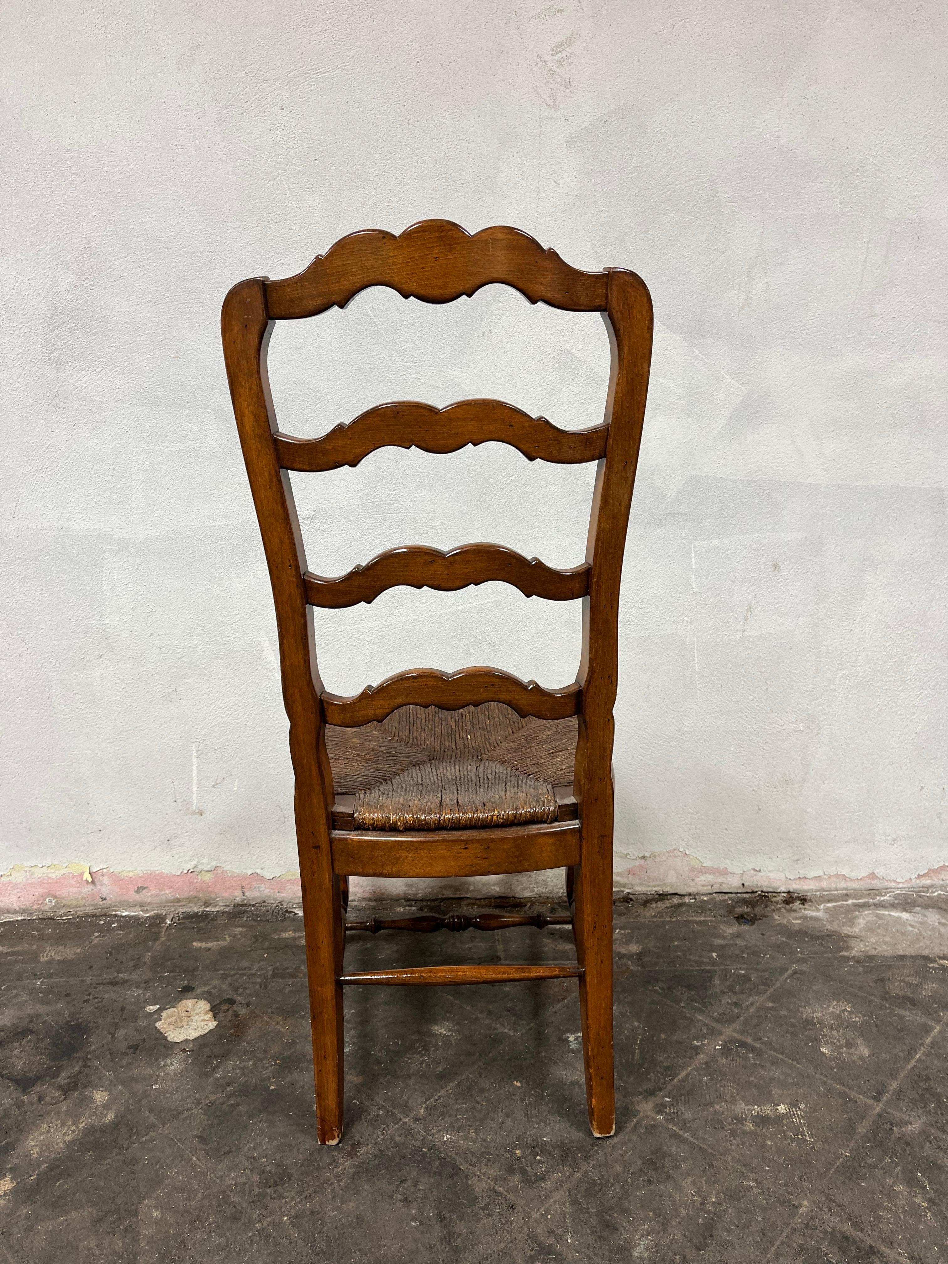 Beautiful Country French ladder back dining chairs with rush seats. Classic design versatile for many decors. Nicely detailed with floral reliefs.