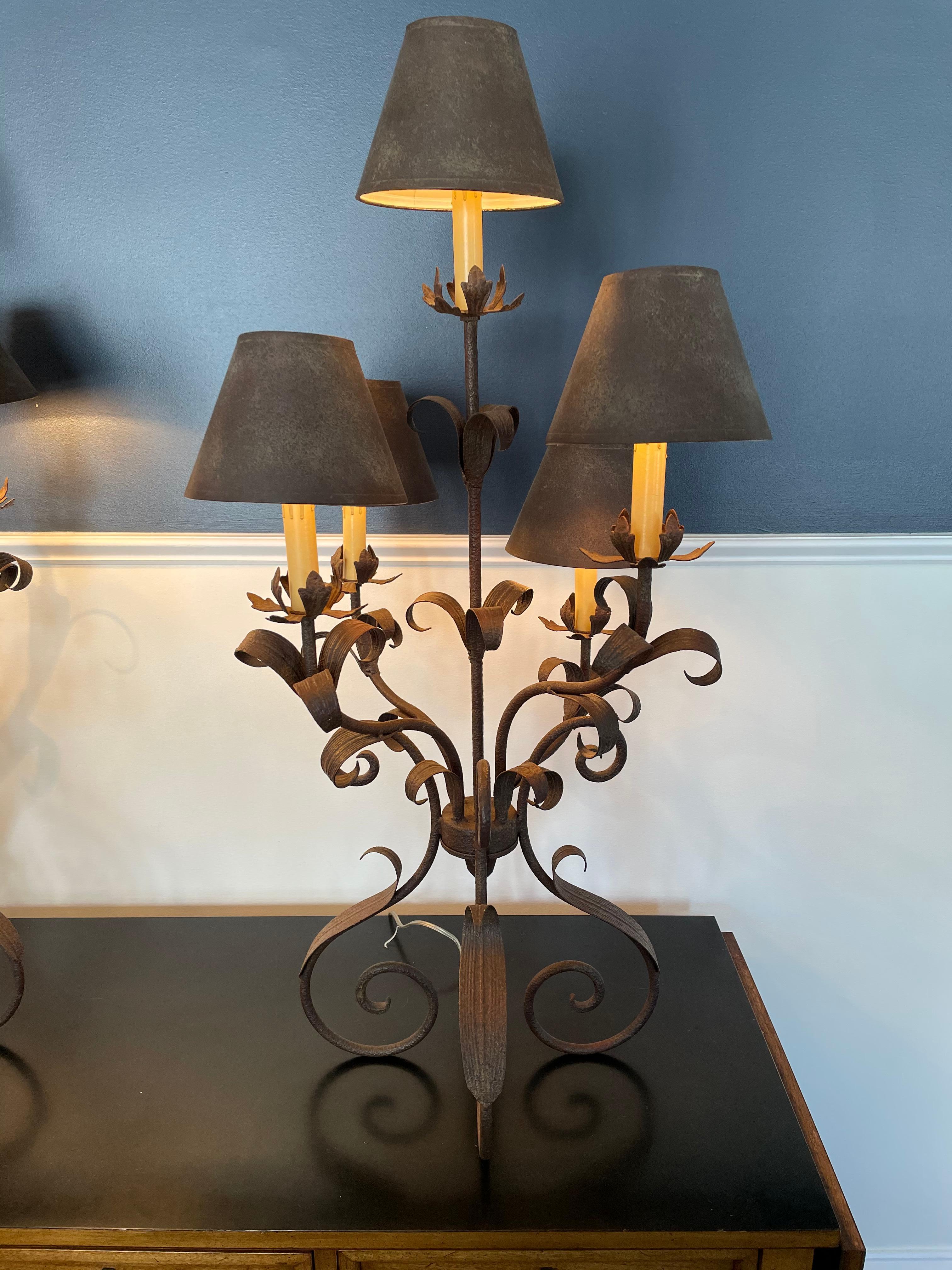 Beautiful candelabra buffet lamps with toleware leaf design each with 5 bulbs. Elegant and dramatic presence. From the estate of Beetle Bailey creator, Mort Walker.
