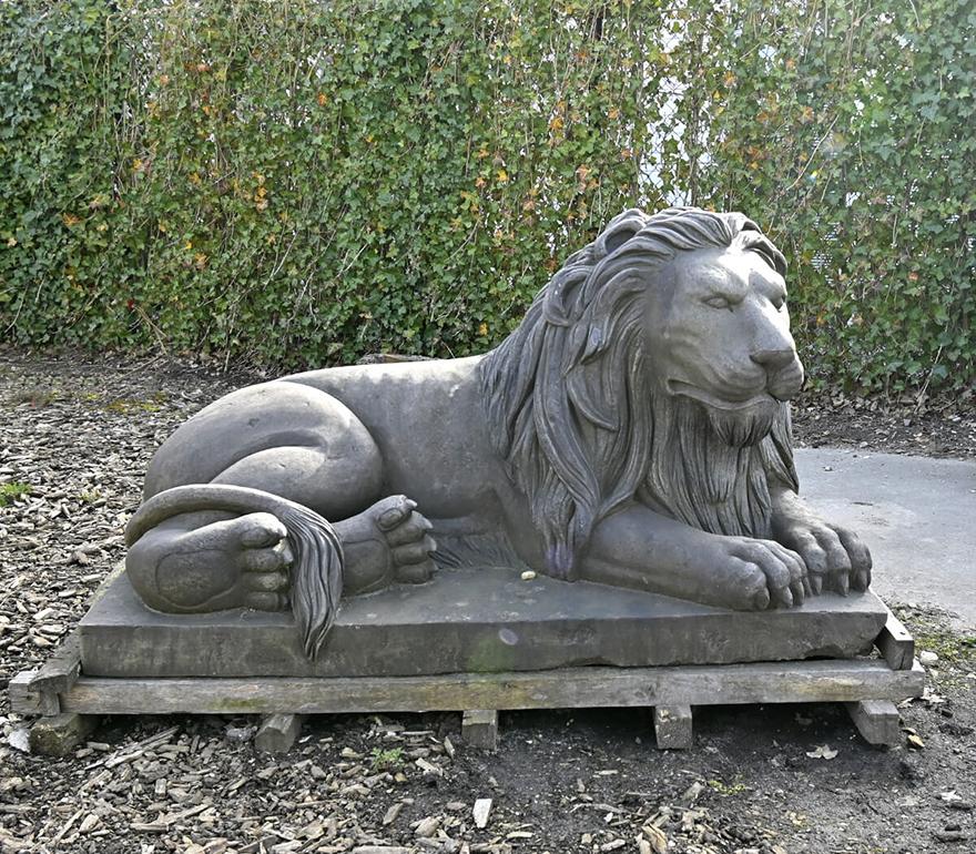 Beautiful vintage couple of lions statues made out of old stone,
from the 20th century.