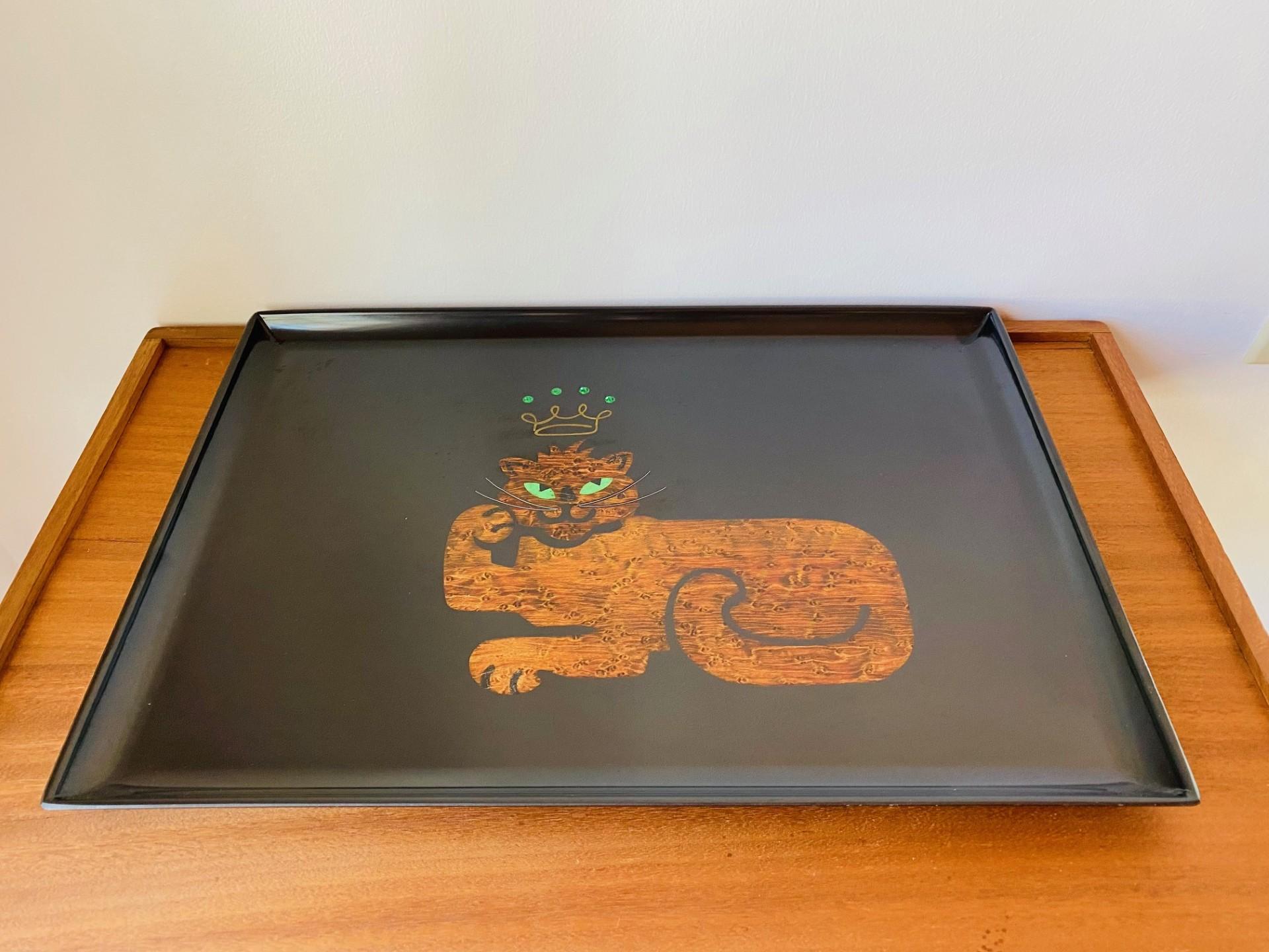 Whimsical mid century serving tray by Couroc of Monterey, made from phenolic resin and inlaid with wood and colorful crystals depicting a stylish cat with a crown.  Phenolic resin is resistant to damage from alcohol and water.  This beautiful piece