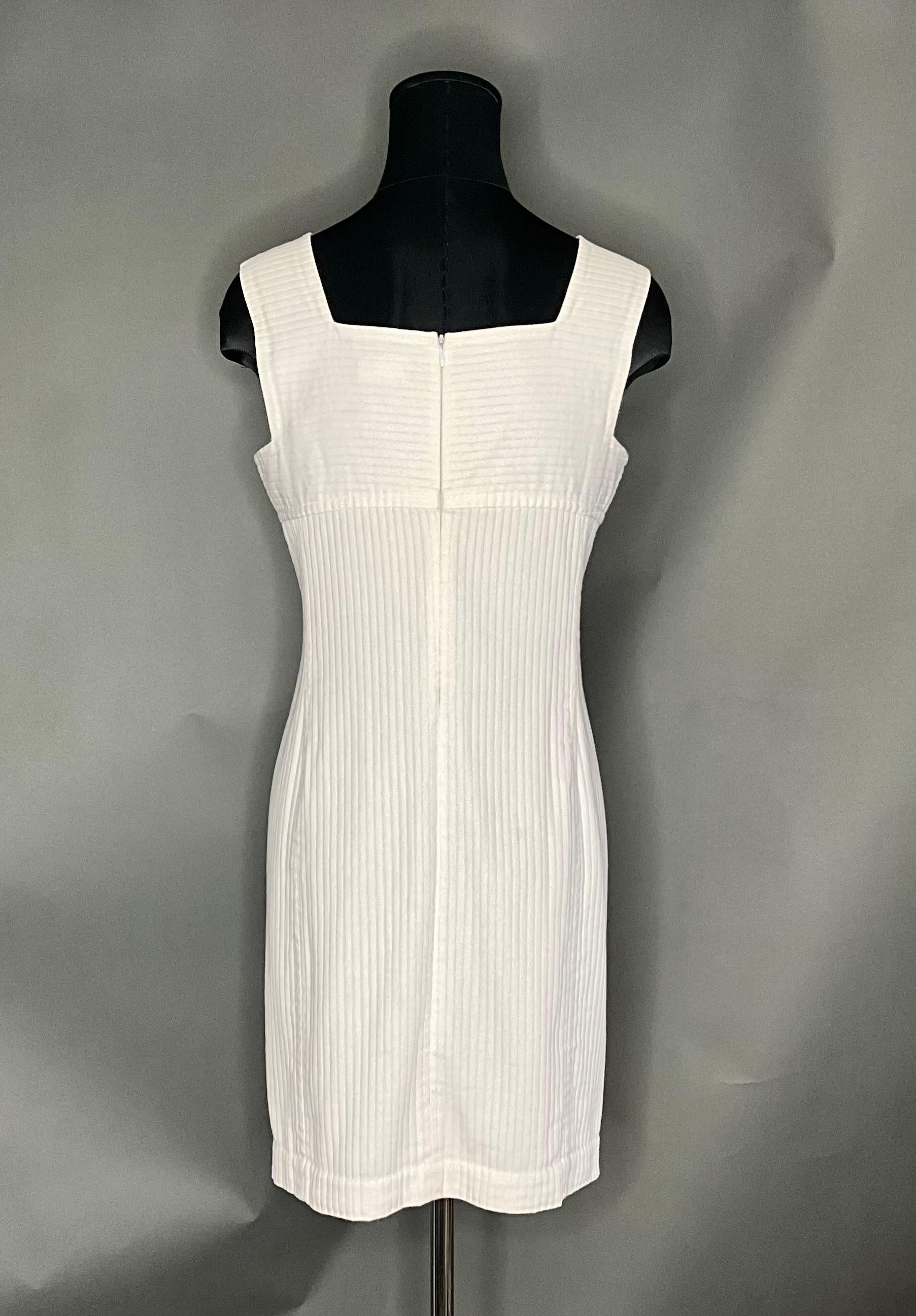 The Vintage Courrèges White Ribbed Dress is a timeless and iconic piece that embodies the minimalist elegance of 1960s French fashion. With its clean lines, ribbed texture, and classic white color, it represents the innovative spirit of Courrèges,