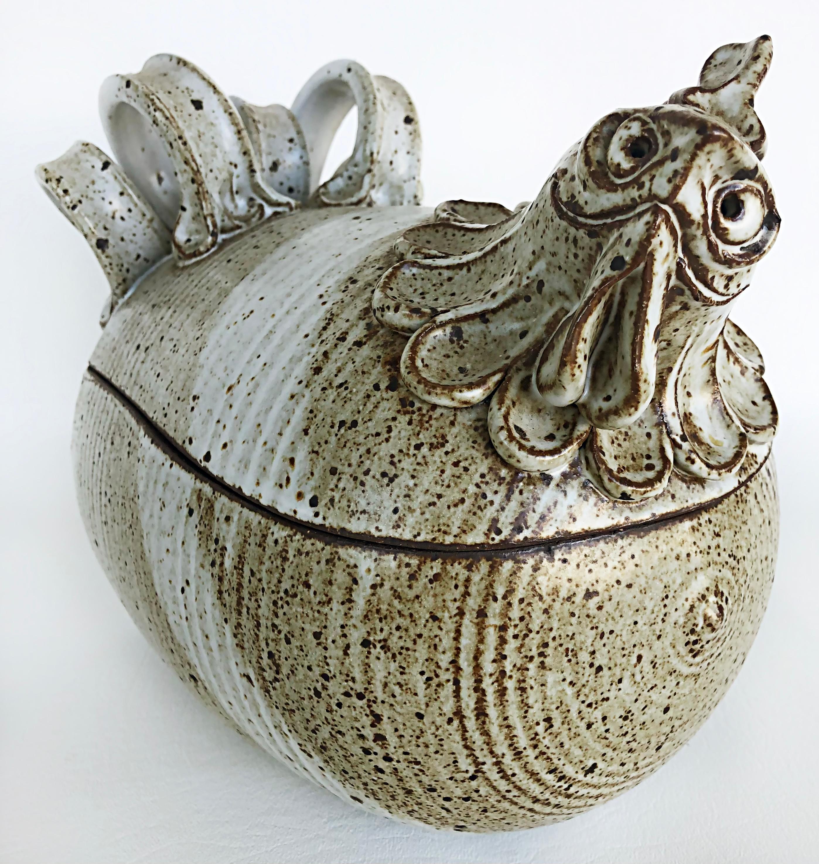 Vintage covered ceramic chicken Tureen vessel, signed 

Offered for sale is a vintage hand-made pottery stylized chicken tureen casserole finished in midcentury tone glazes. The side is marked with an illegible monogram as shown. This is a fun