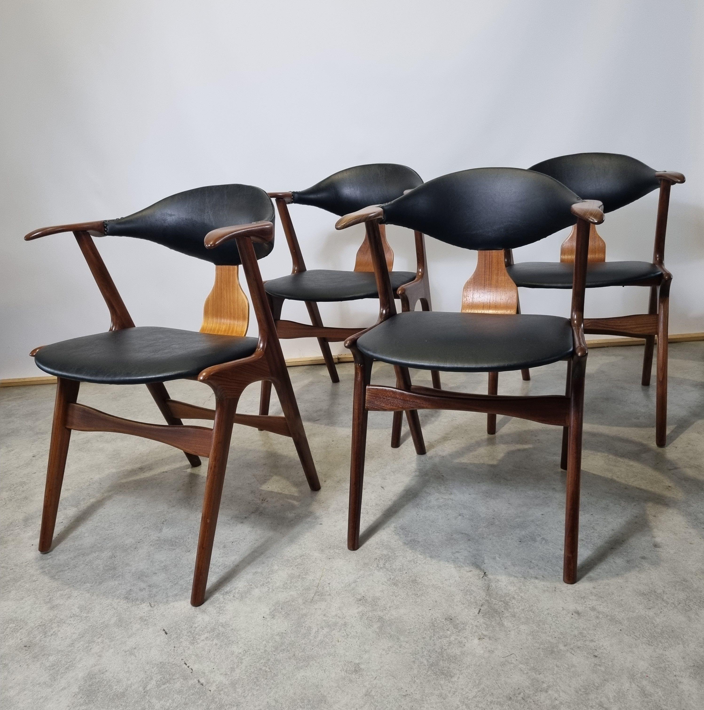 Designed by Louis van Teeffelen for Dutch AWA , made of solid teak. The chairs were reupholstered with high quality leatherette which resembles the original upholstery of this chair. Chairs are in perfect condition. The teak frame was refreshed and